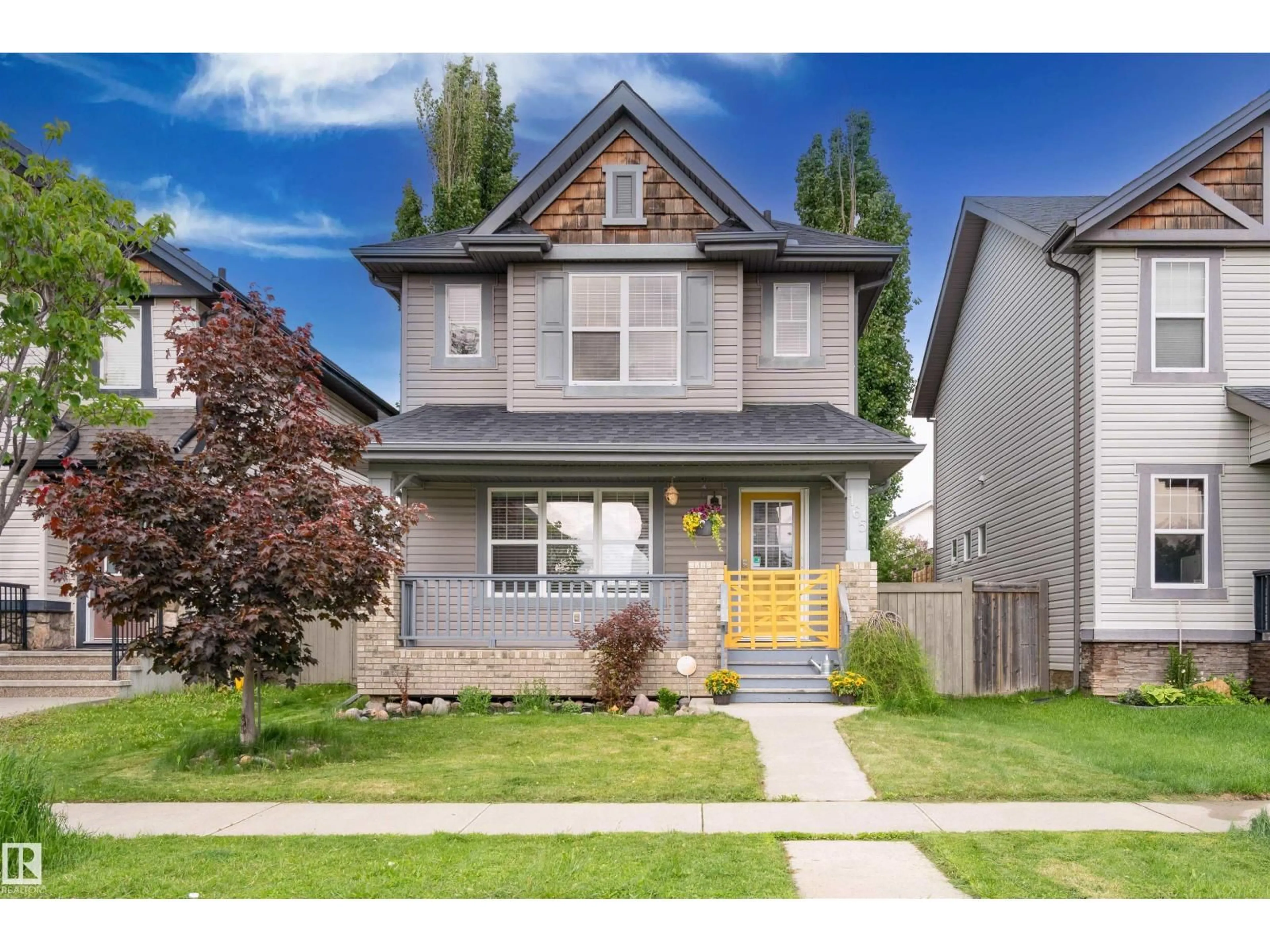 Home with vinyl exterior material, street for SW - 165 62 ST, Edmonton Alberta T6X0B9
