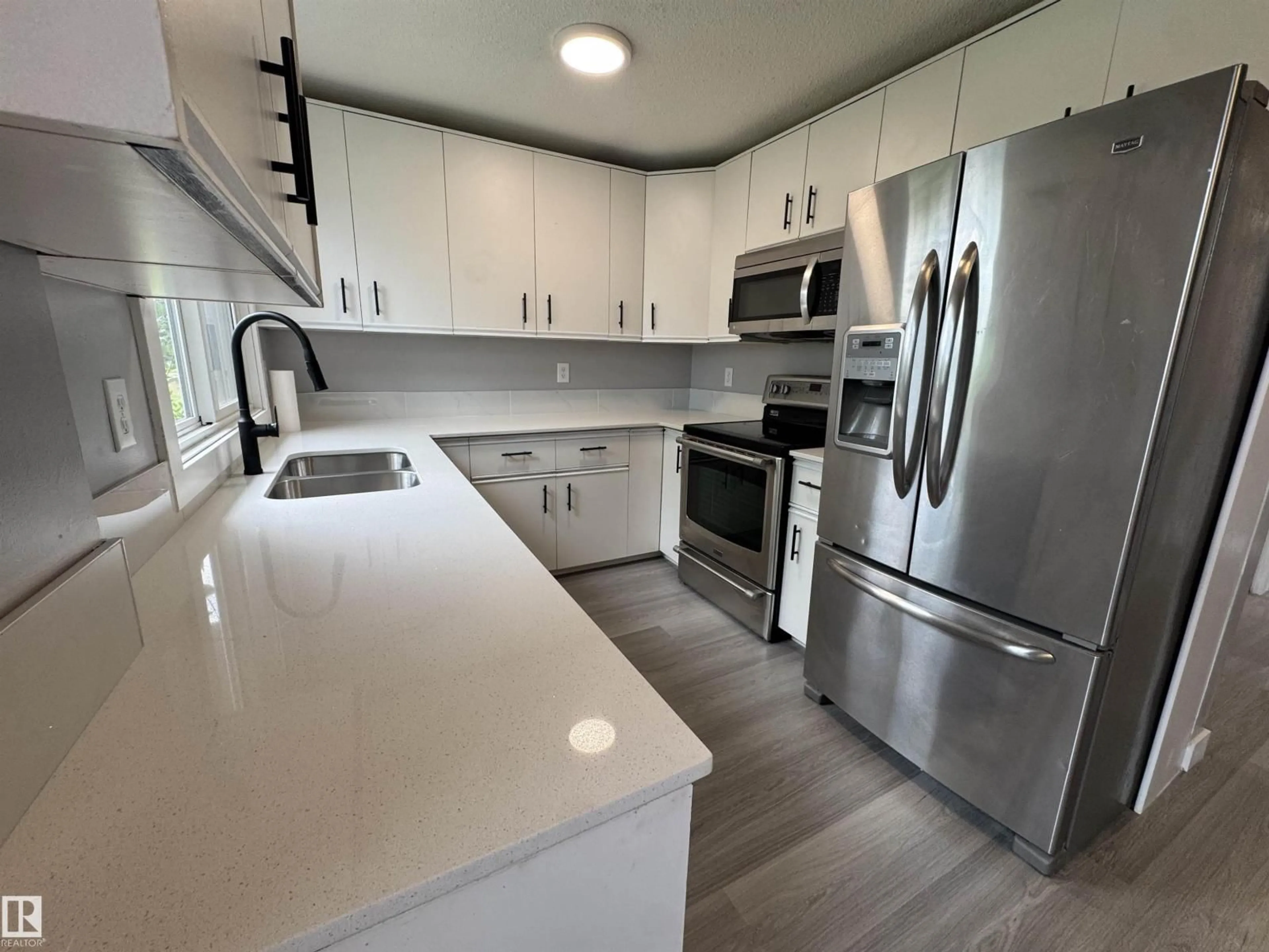 Open concept kitchen, unknown for NW - 6441 180 ST, Edmonton Alberta T5T2P3