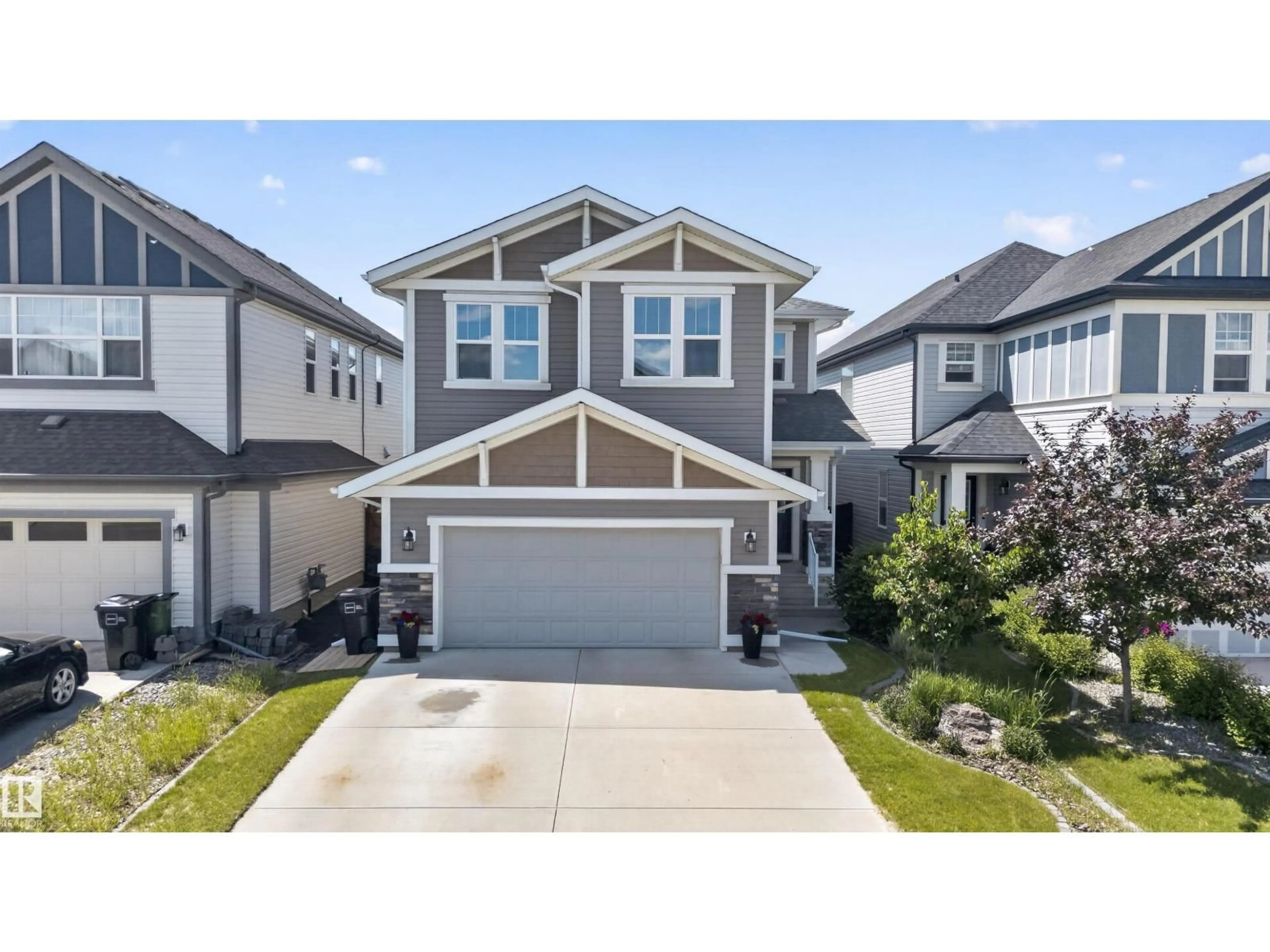 Home with vinyl exterior material, street for NW - 9432 229 ST, Edmonton Alberta T5T7B3