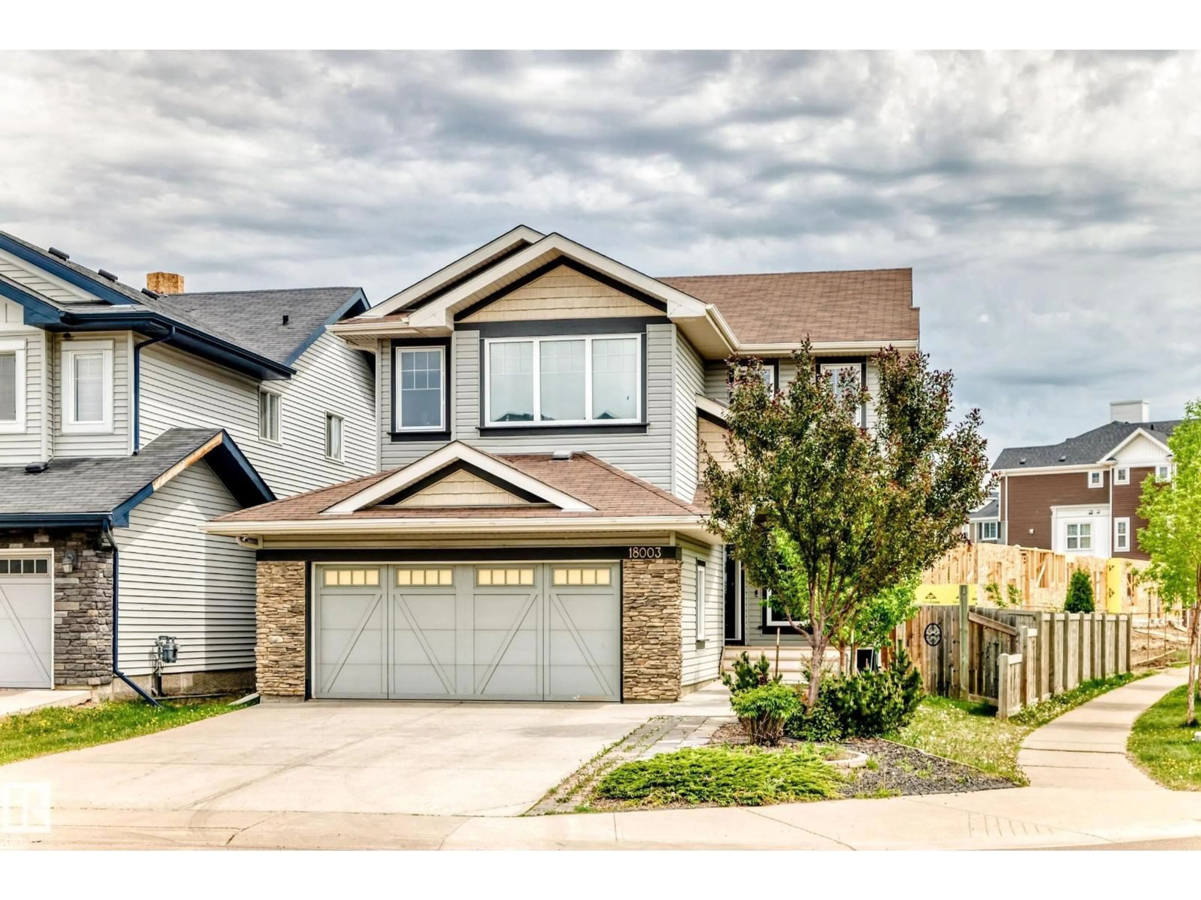 Home with vinyl exterior material, street for NW - 18003 77 ST, Edmonton Alberta T5Z0L1