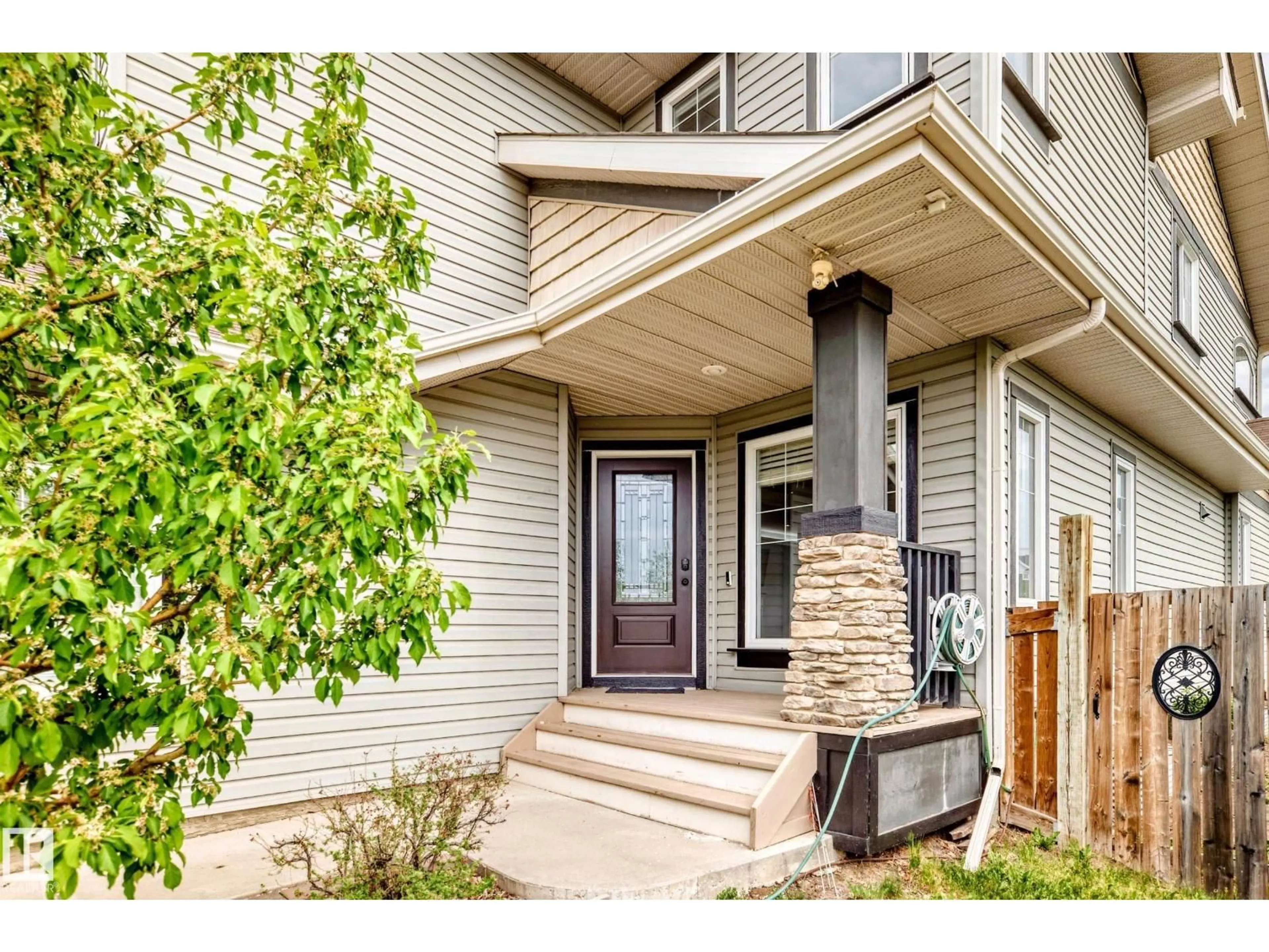 Home with vinyl exterior material, street for NW - 18003 77 ST, Edmonton Alberta T5Z0L1