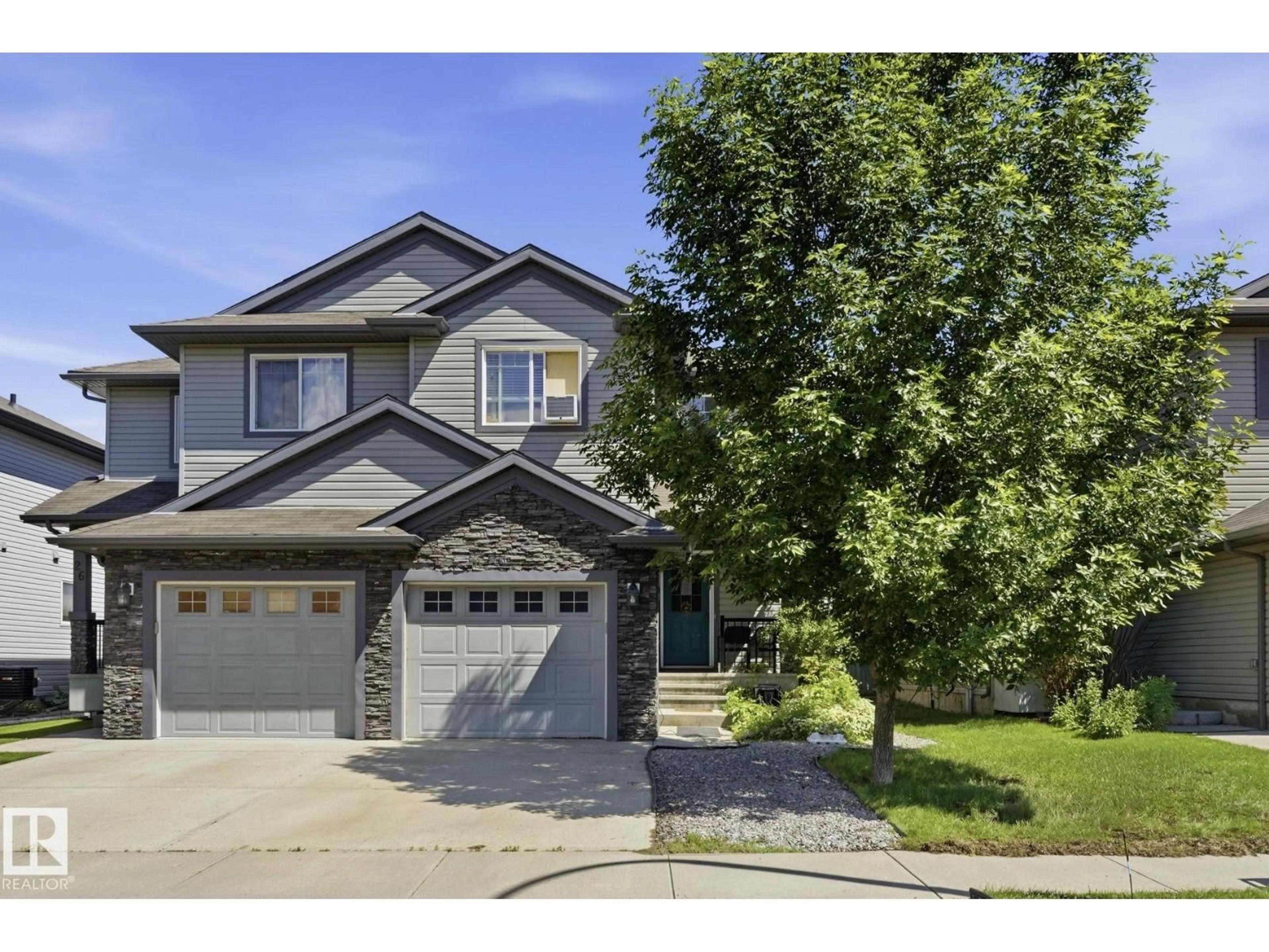 Home with vinyl exterior material, street for 28 WELLINGTON PL, Fort Saskatchewan Alberta T8L0G3