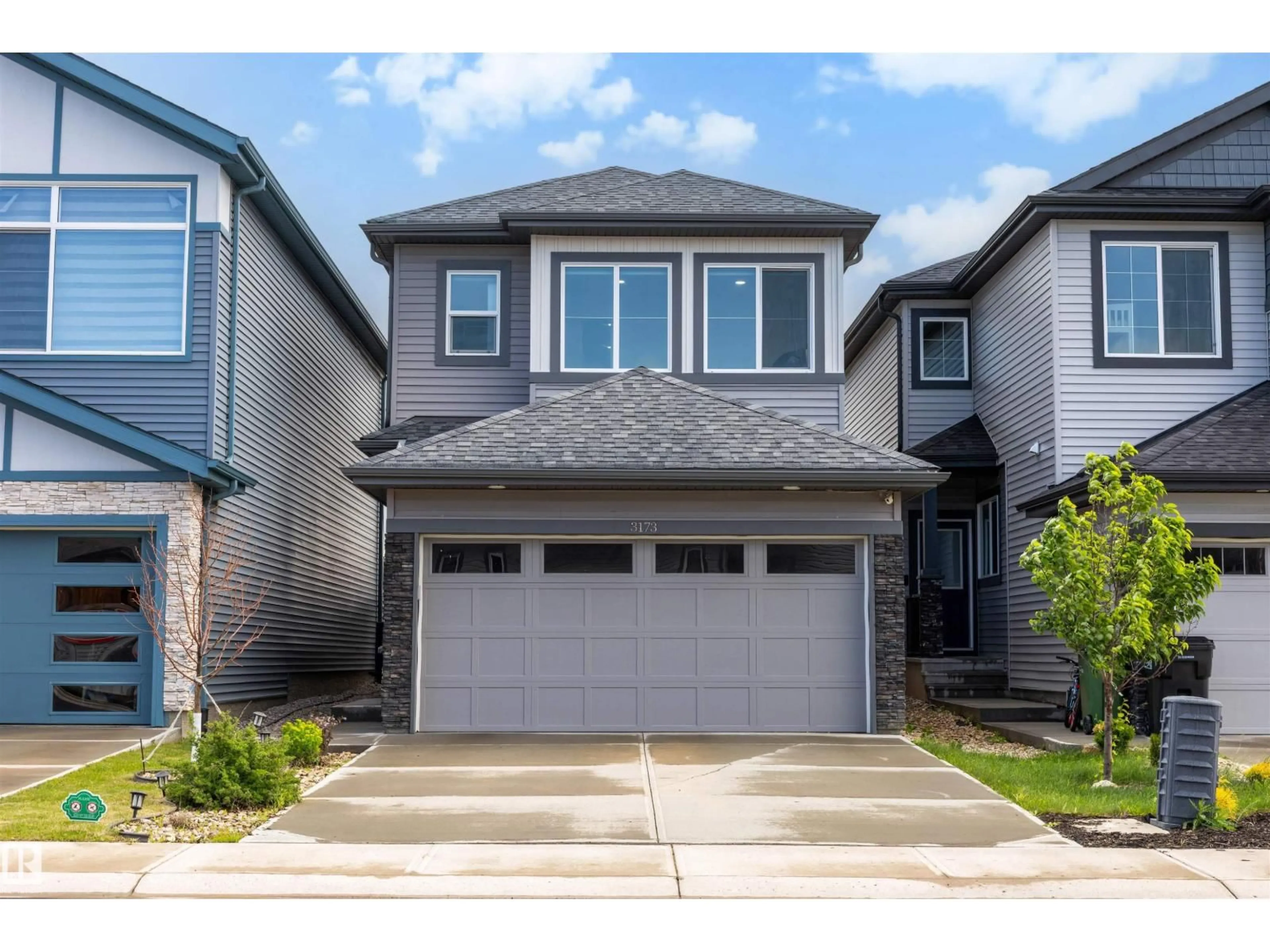 Home with vinyl exterior material, street for 3173 CHECKNITA WY, Edmonton Alberta T6W4W7