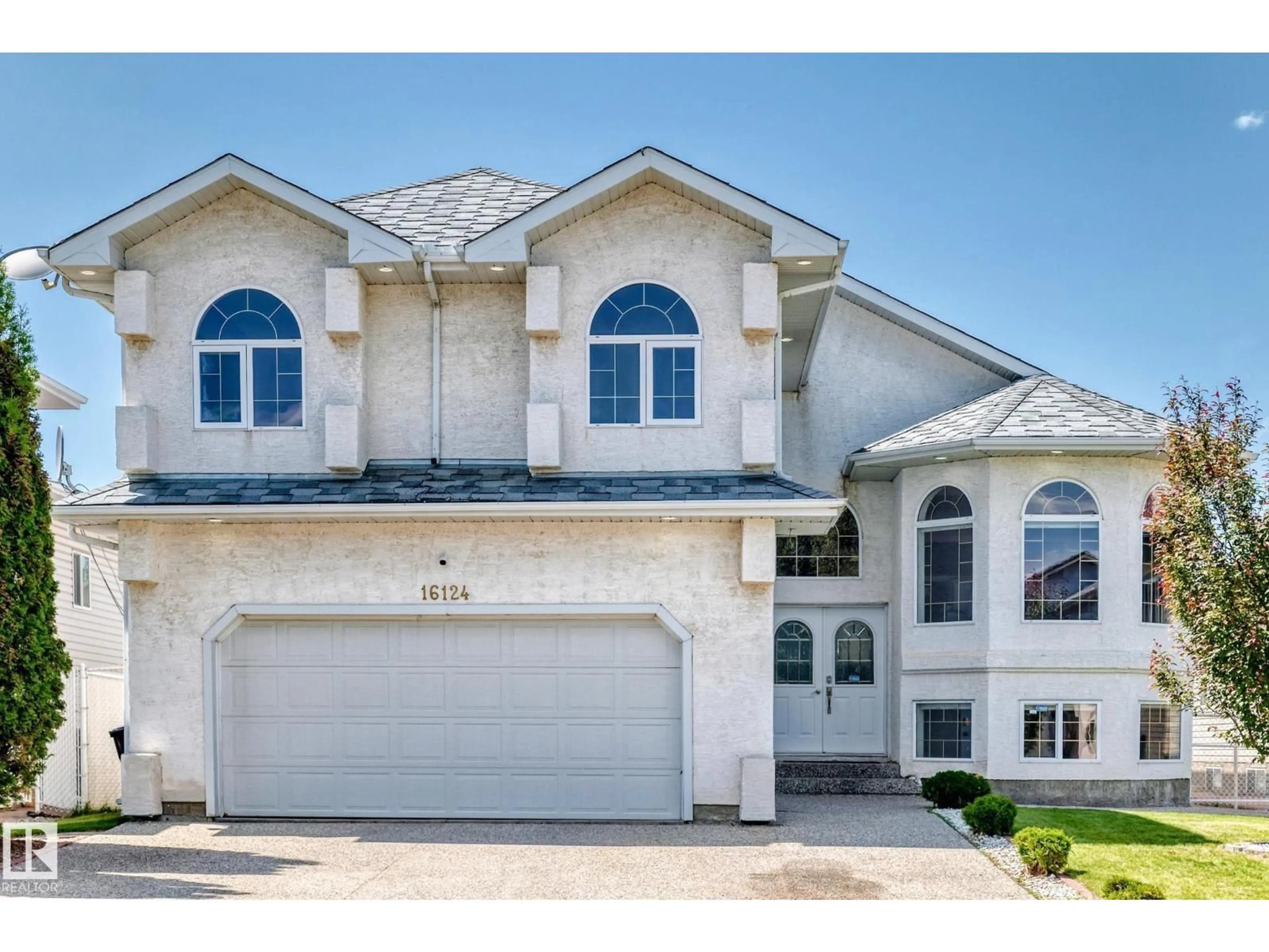 Home with vinyl exterior material, street for NW - 16124 76 ST, Edmonton Alberta T5Z3R8