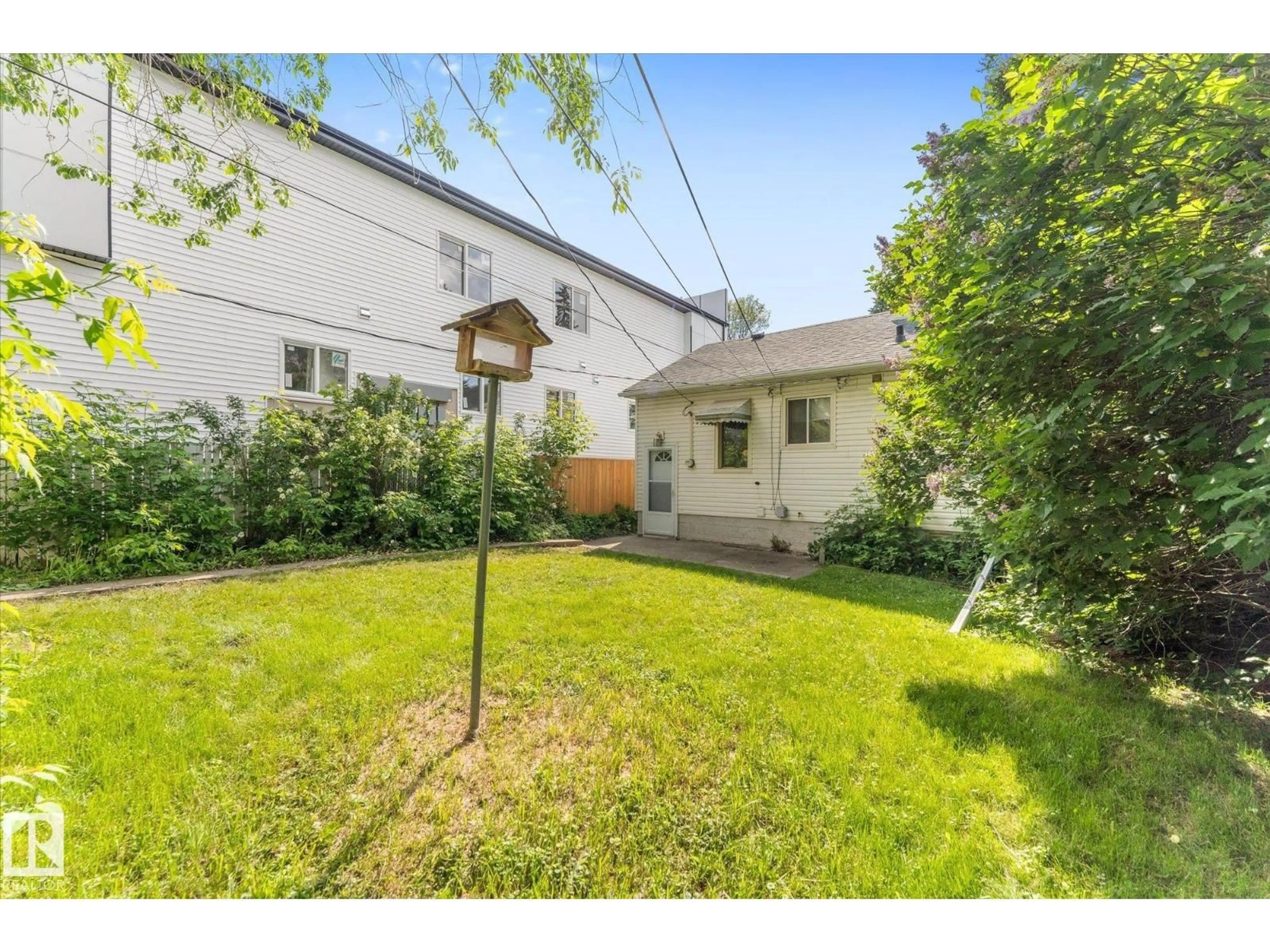 A pic from outside/outdoor area/front of a property/back of a property/a pic from drone, street for 9315 86 ST, Edmonton Alberta T6C3E6
