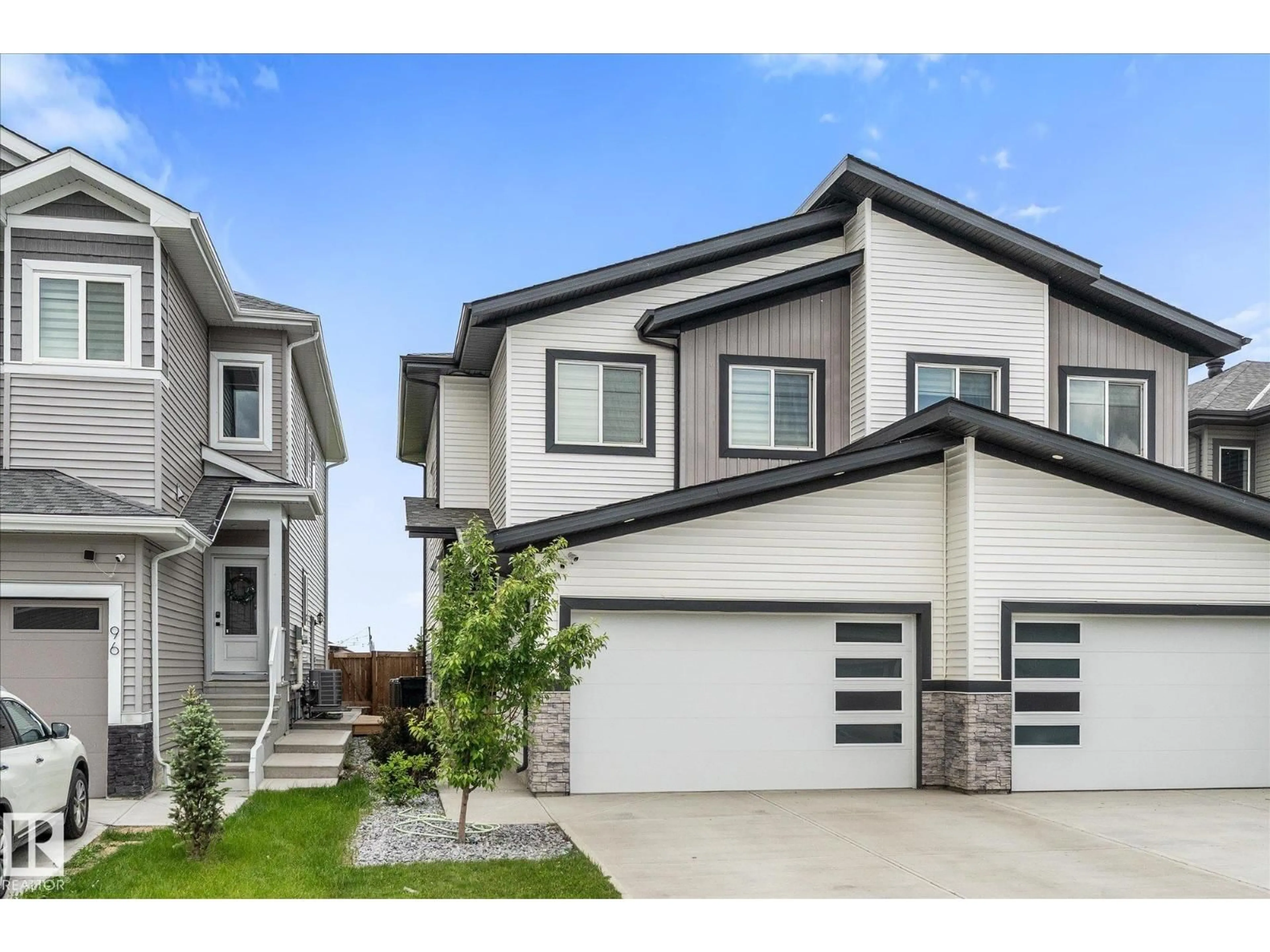 Home with vinyl exterior material, street for 94 ELM ST, Fort Saskatchewan Alberta T8L0X8