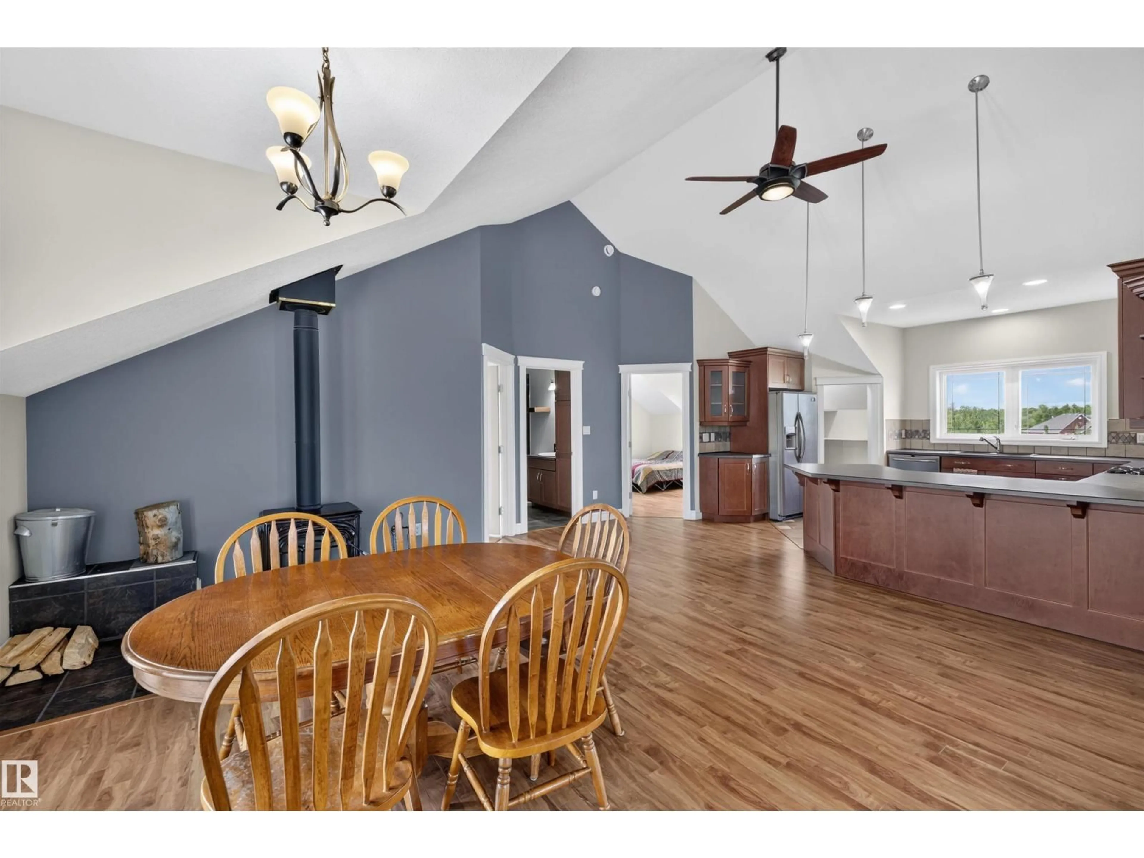 Open concept kitchen, wood/laminate floor for 232 - 60 RNG RD, Rural Leduc County Alberta T4X0L1