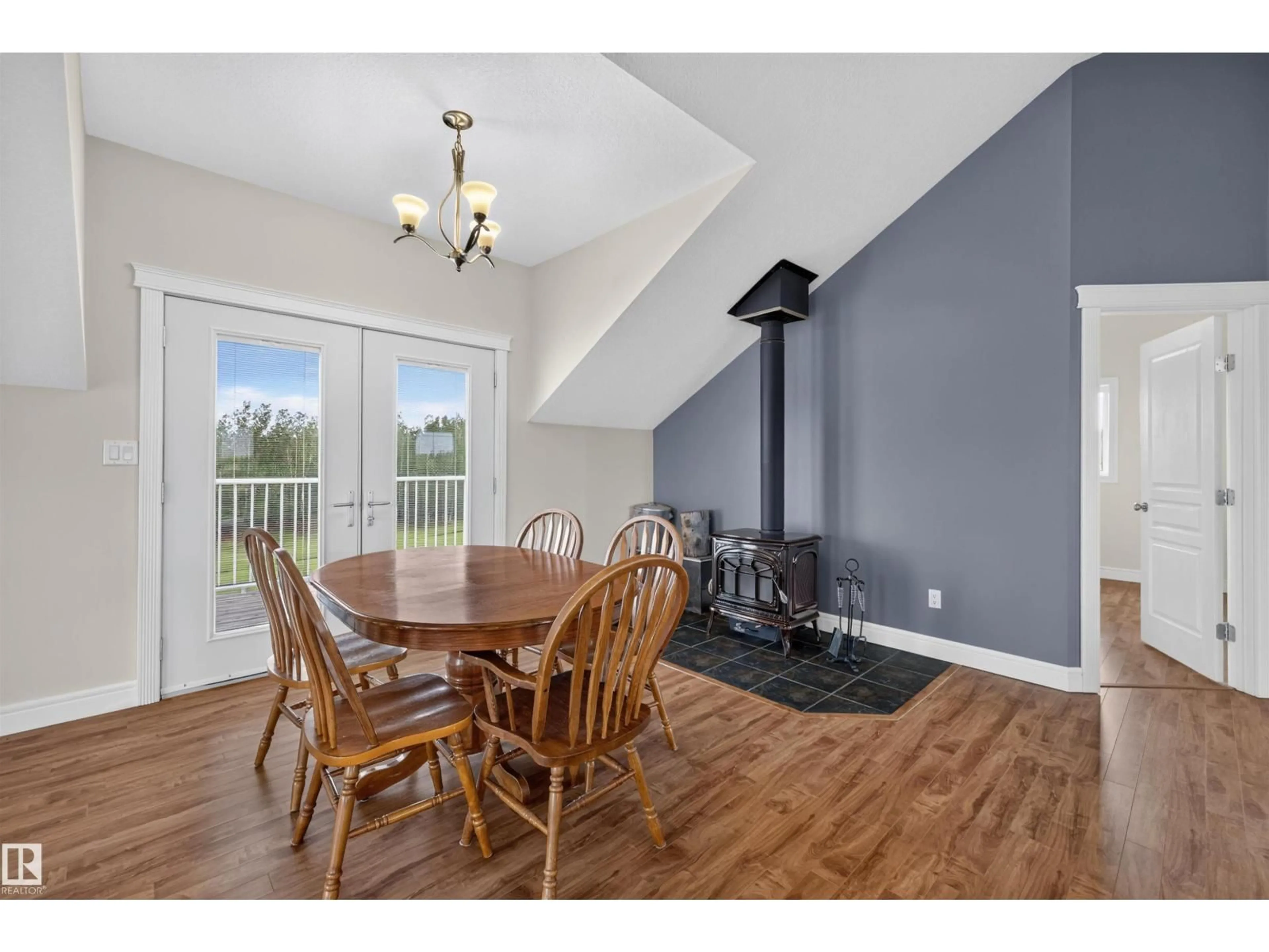 Dining room, wood/laminate floor for 232 - 60 RNG RD, Rural Leduc County Alberta T4X0L1