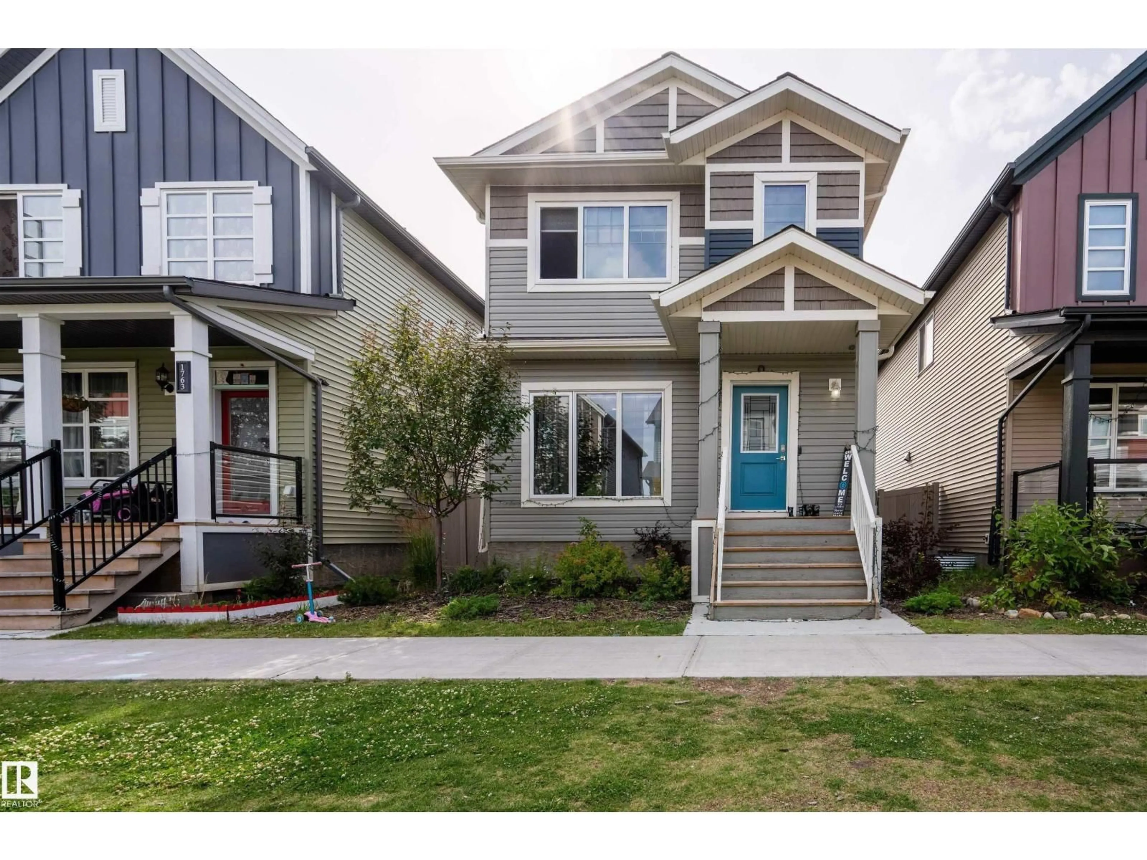 Home with vinyl exterior material, street for NW - 1767 26A ST, Edmonton Alberta T6T2H8