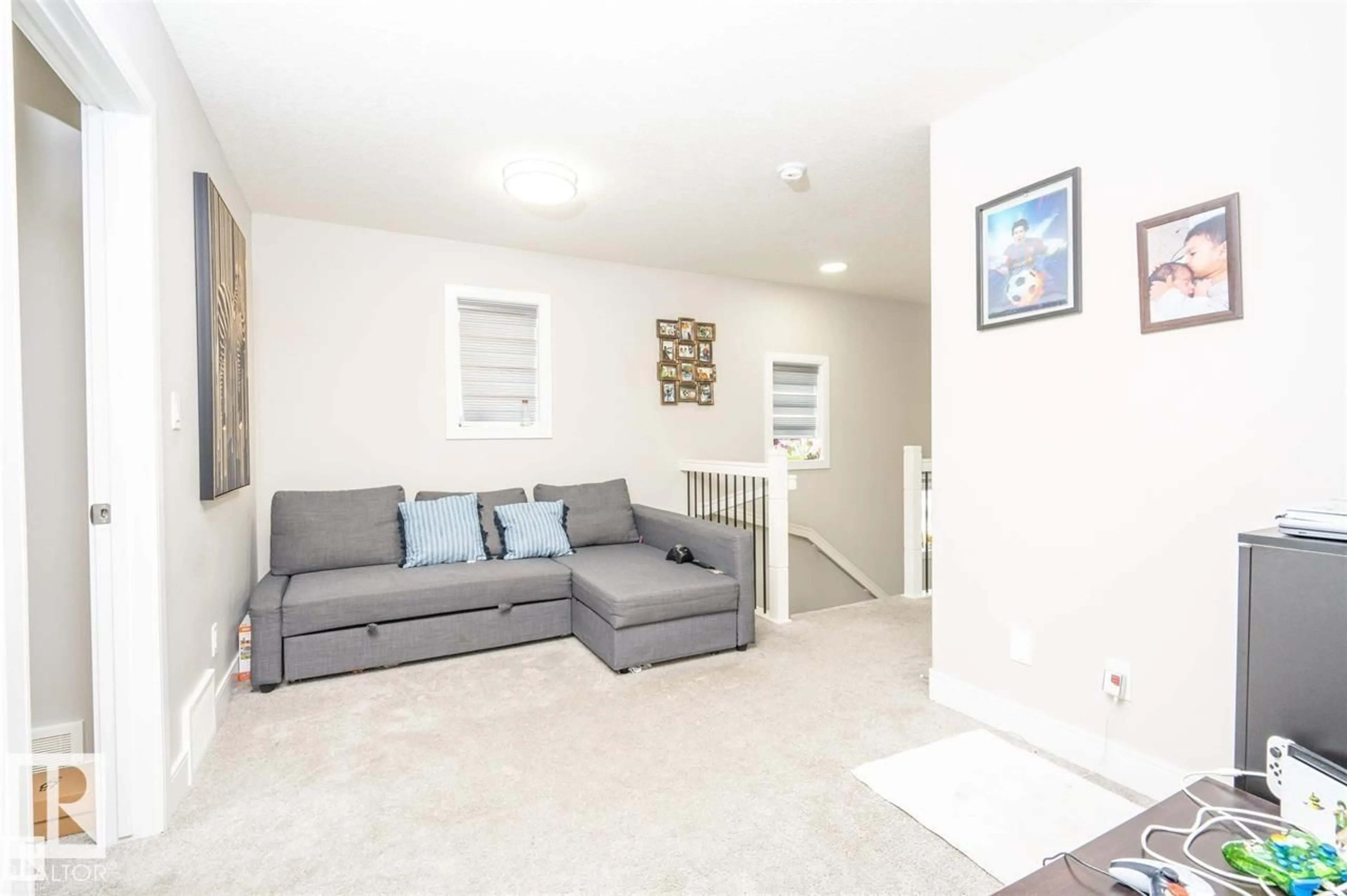 Living room with furniture, unknown for NW - 1767 26A ST, Edmonton Alberta T6T2H8