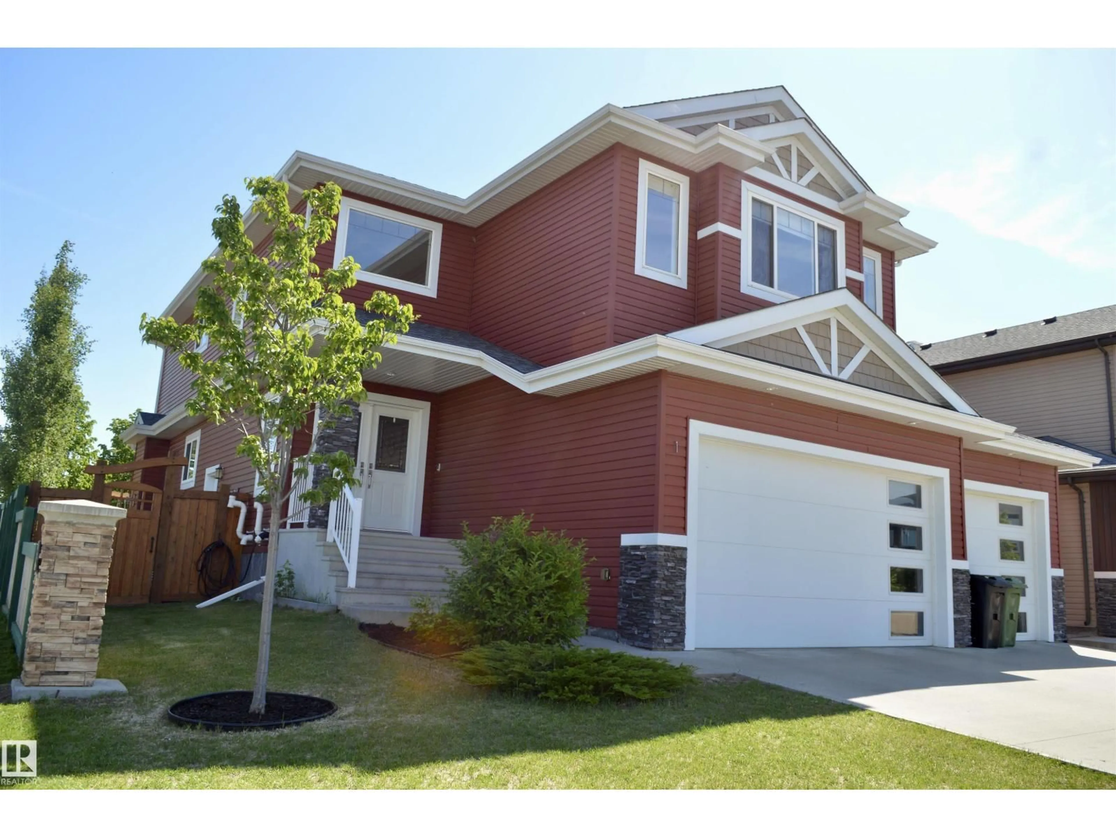 Home with brick exterior material, street for 1 HEMLOCK CL, Fort Saskatchewan Alberta T8L0V9