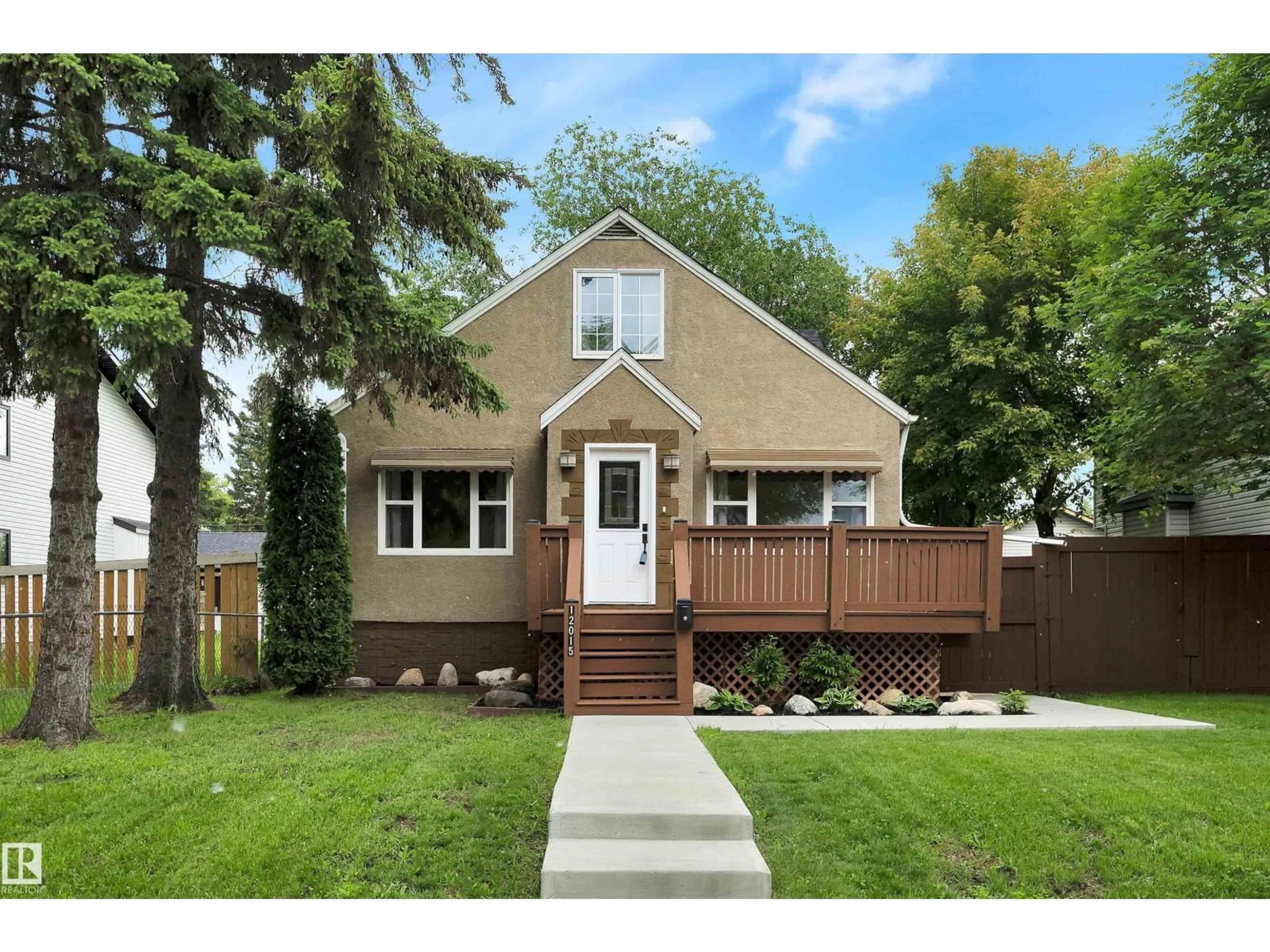Home with vinyl exterior material, street for NW - 12015 124 ST, Edmonton Alberta T5L0M8