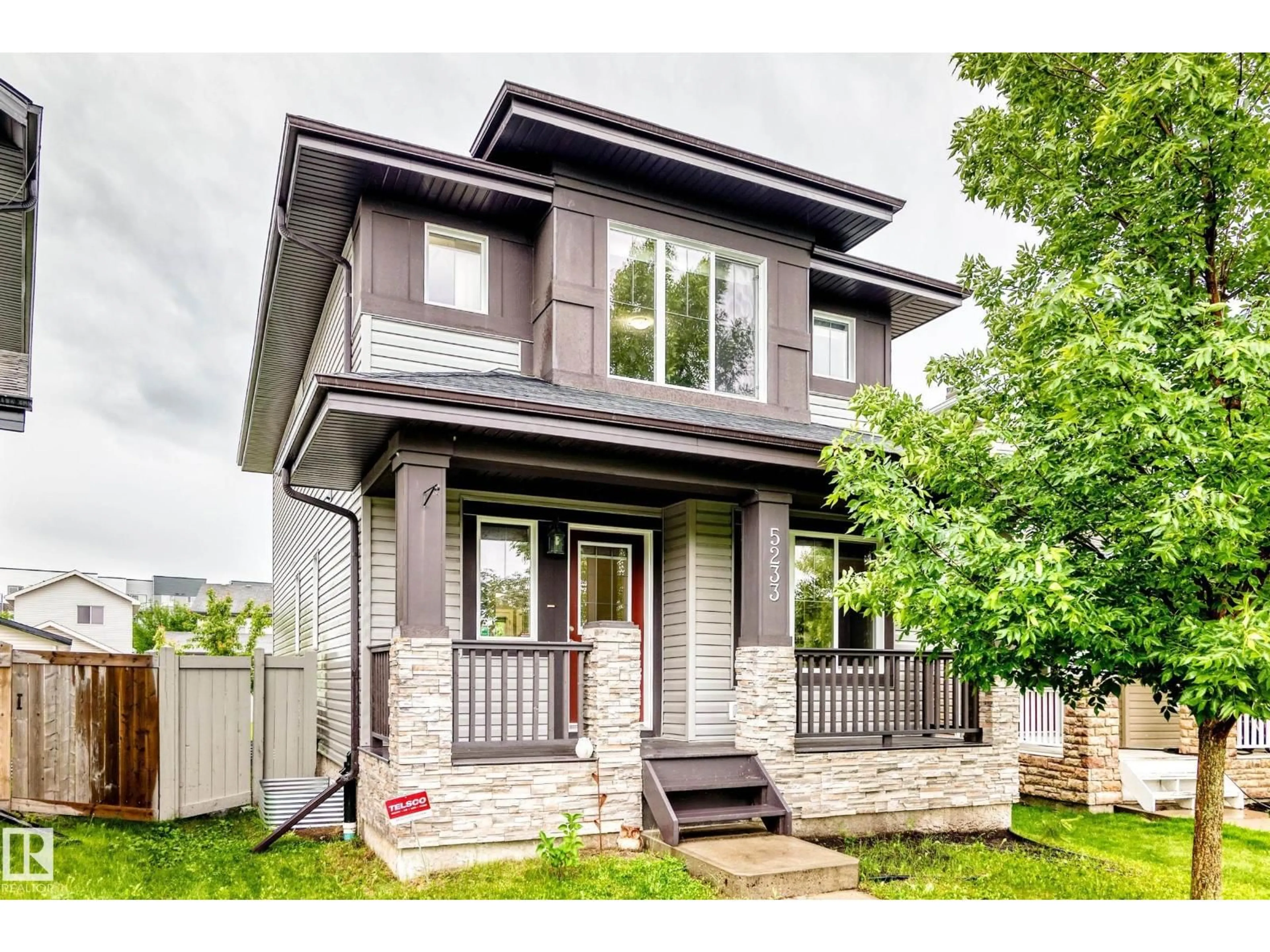 Home with vinyl exterior material, street for SW - 5233 2A AV, Edmonton Alberta T6X0R3