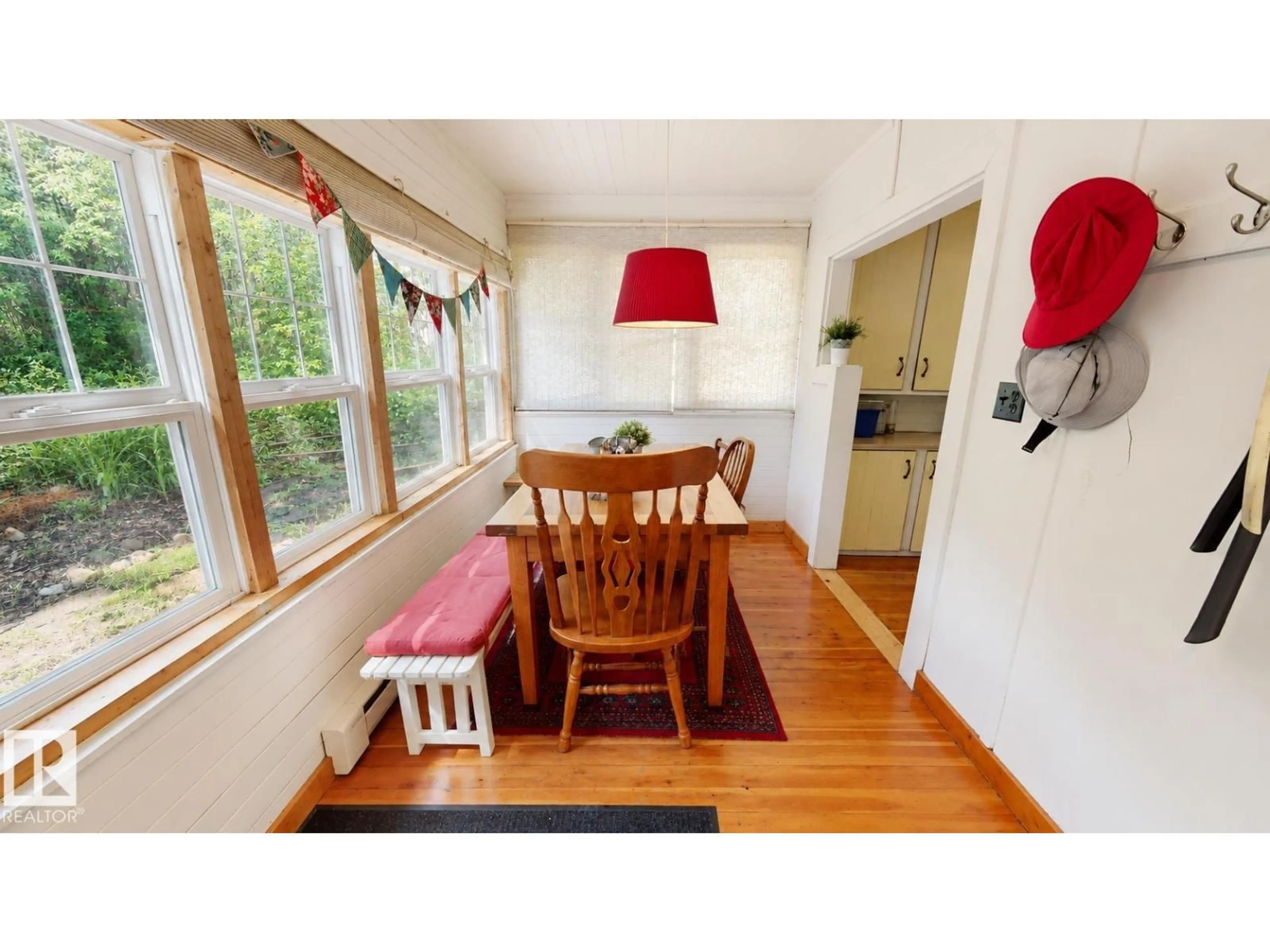 Dining room, wood/laminate floor for S - 144 6 ST, Rural Parkland County Alberta T0E2B0
