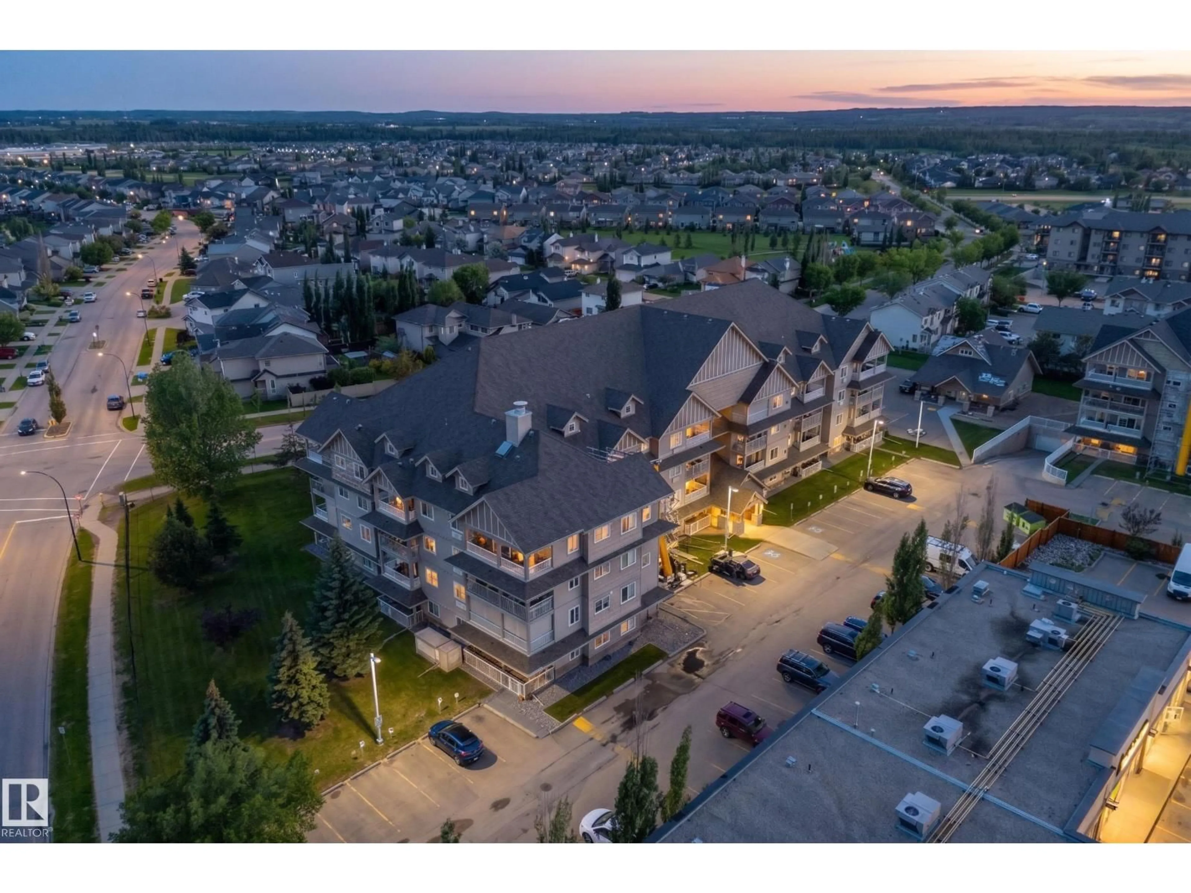 A pic from outside/outdoor area/front of a property/back of a property/a pic from drone, unknown for 204A - 6 SPRUCE RIDGE DR, Spruce Grove Alberta T7X4M5