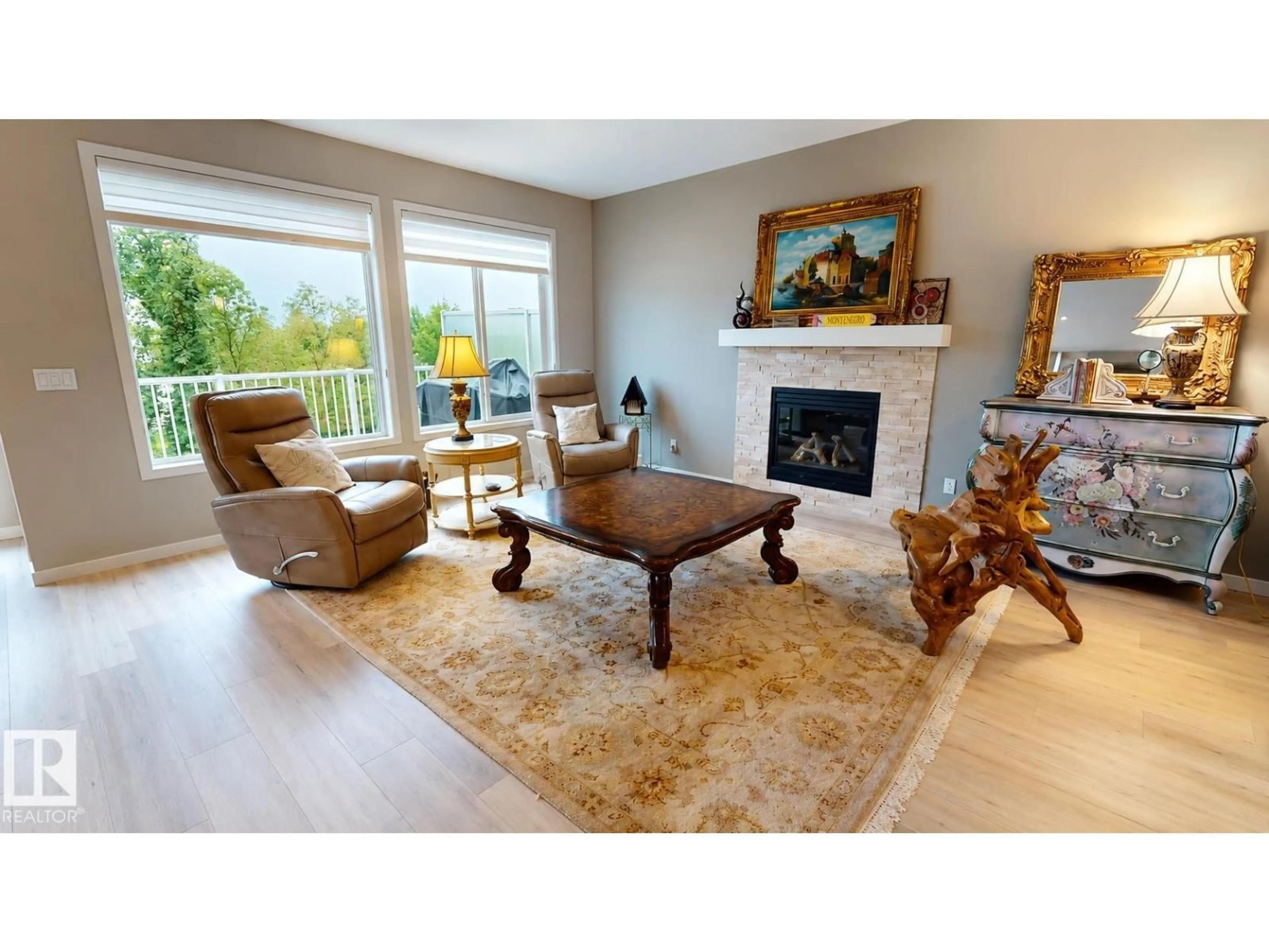 Living room with furniture, unknown for NW NW - 2022 REDTAIL CM, Edmonton Alberta T5S0H2