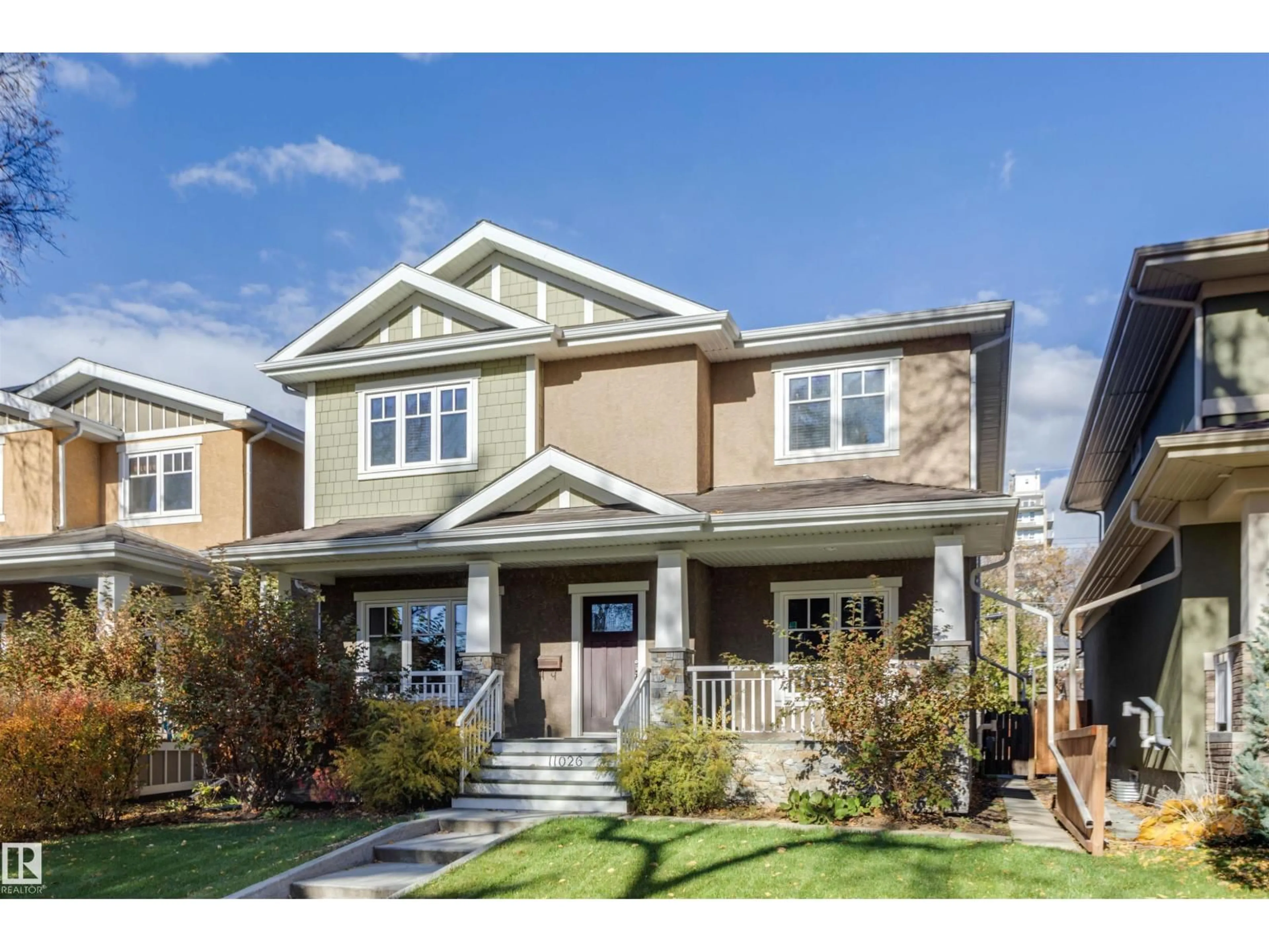 Home with vinyl exterior material, street for 11026 80 AV, Edmonton Alberta T6G0R3