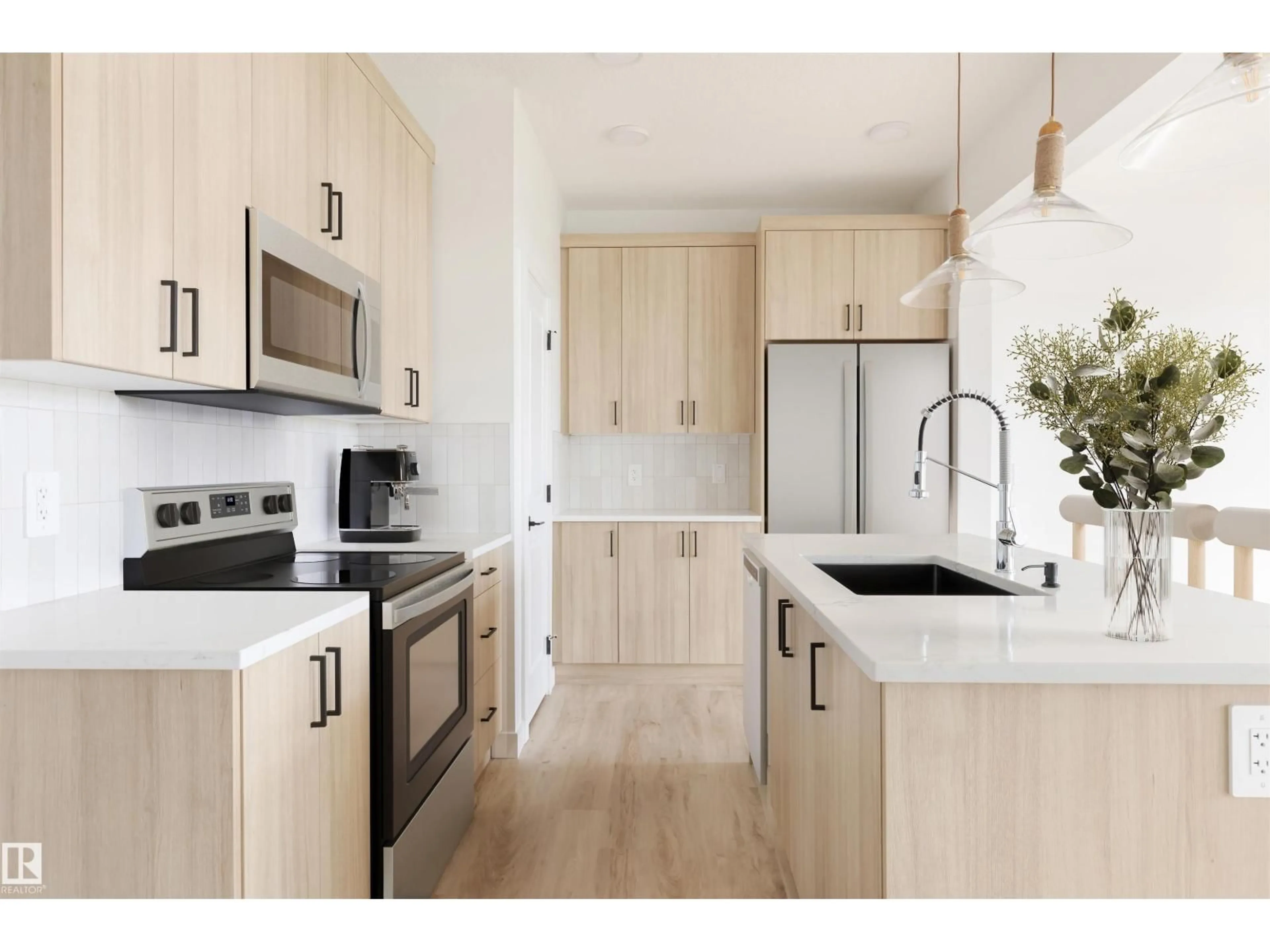 Open concept kitchen, wood/laminate floor for 47 CHARTRES CL, St. Albert Alberta T8T2E1