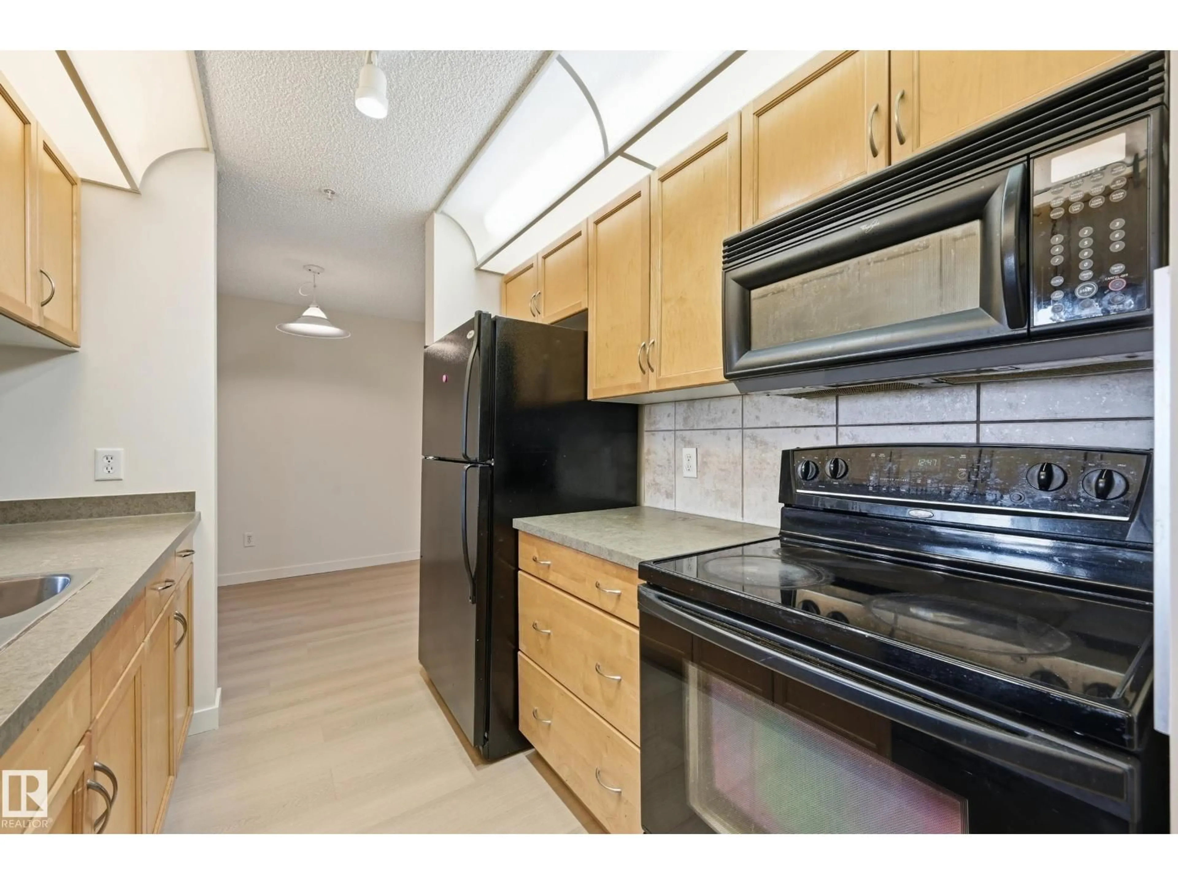 Standard kitchen, unknown for #314 - 2430 GUARDIAN RD, Edmonton Alberta T5T6X9
