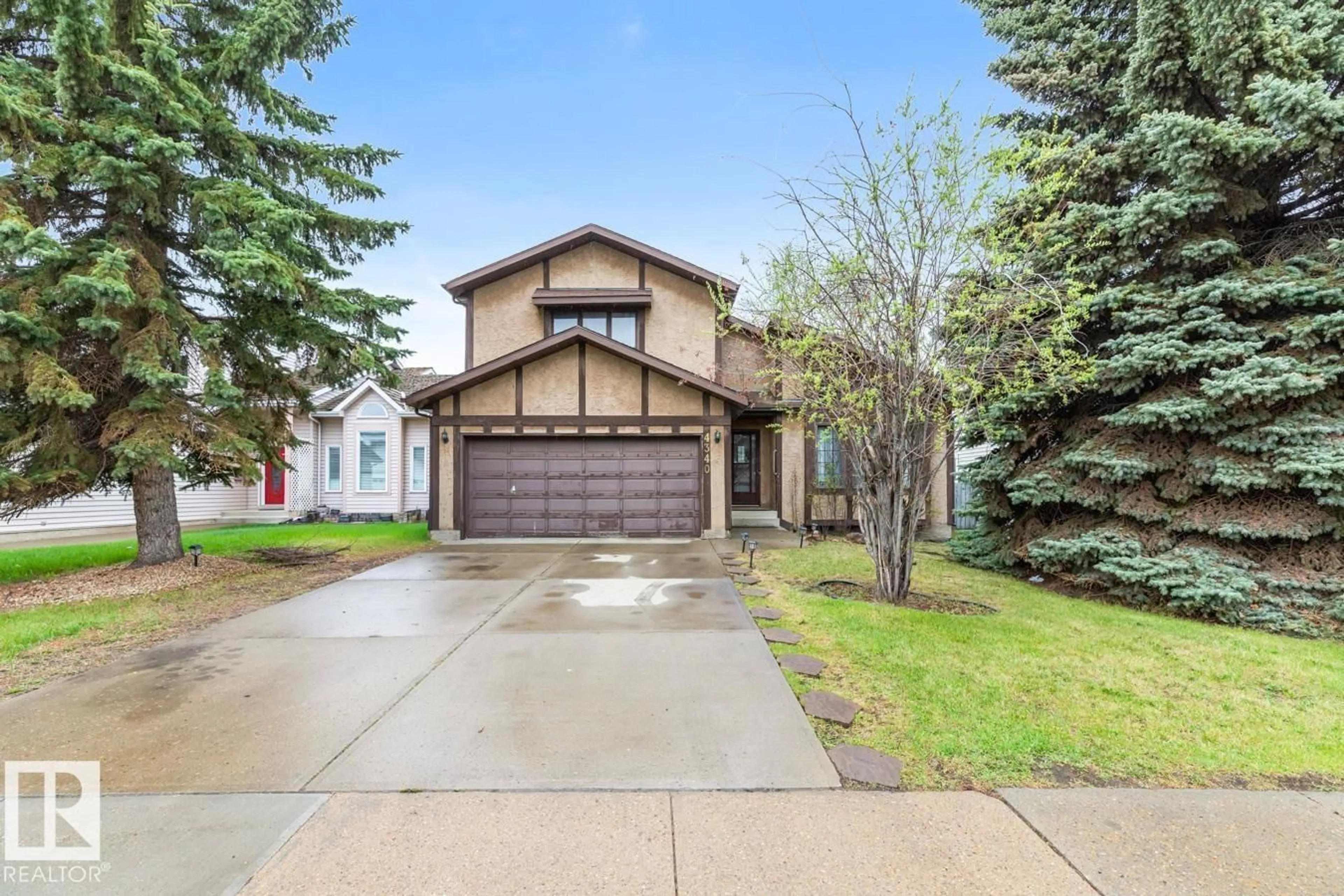 Home with vinyl exterior material, street for 4340 33 ST, Edmonton Alberta T6T1B7