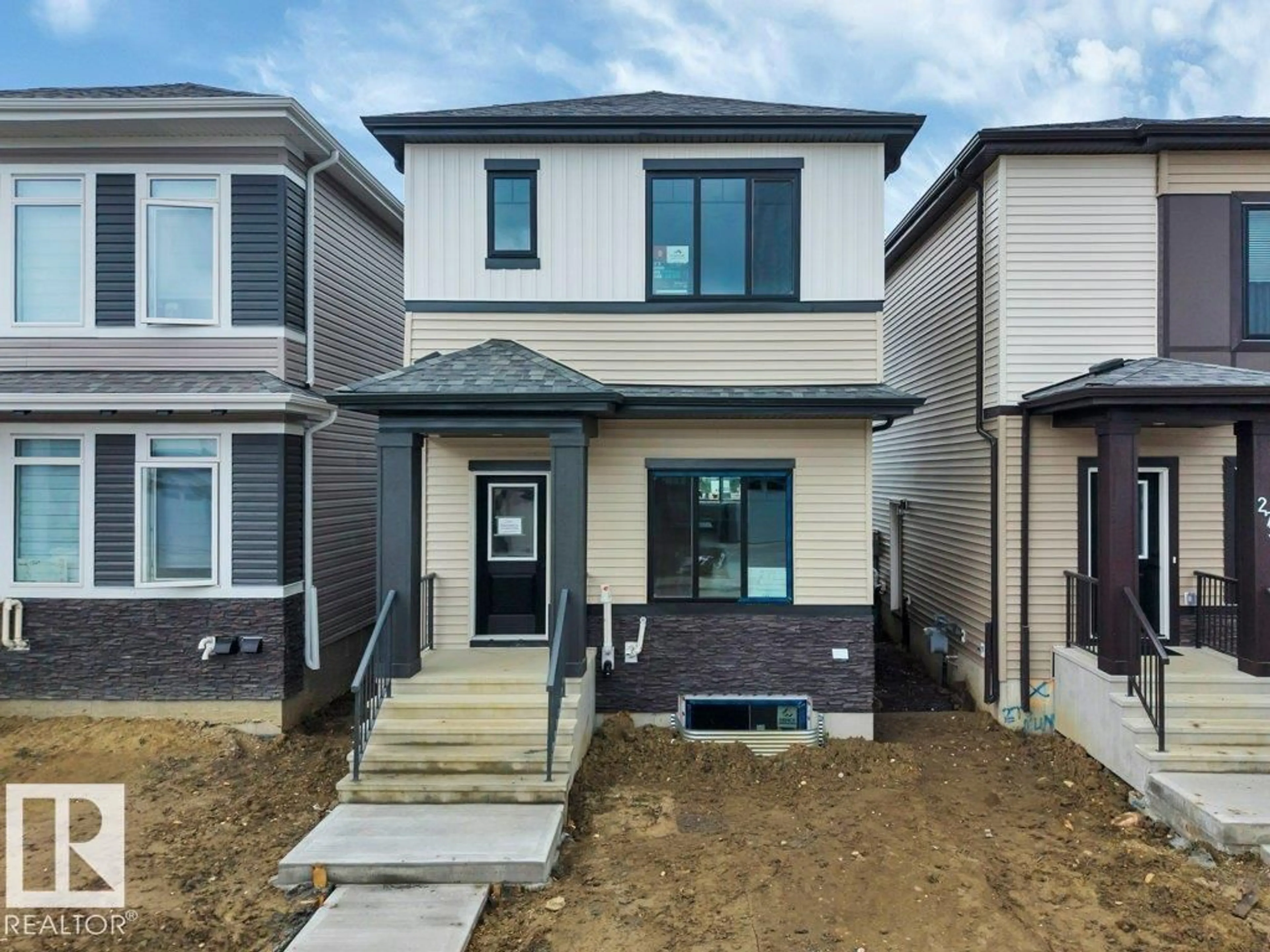 Home with vinyl exterior material, street for 271 MUNN WY, Leduc Alberta T9E1V2