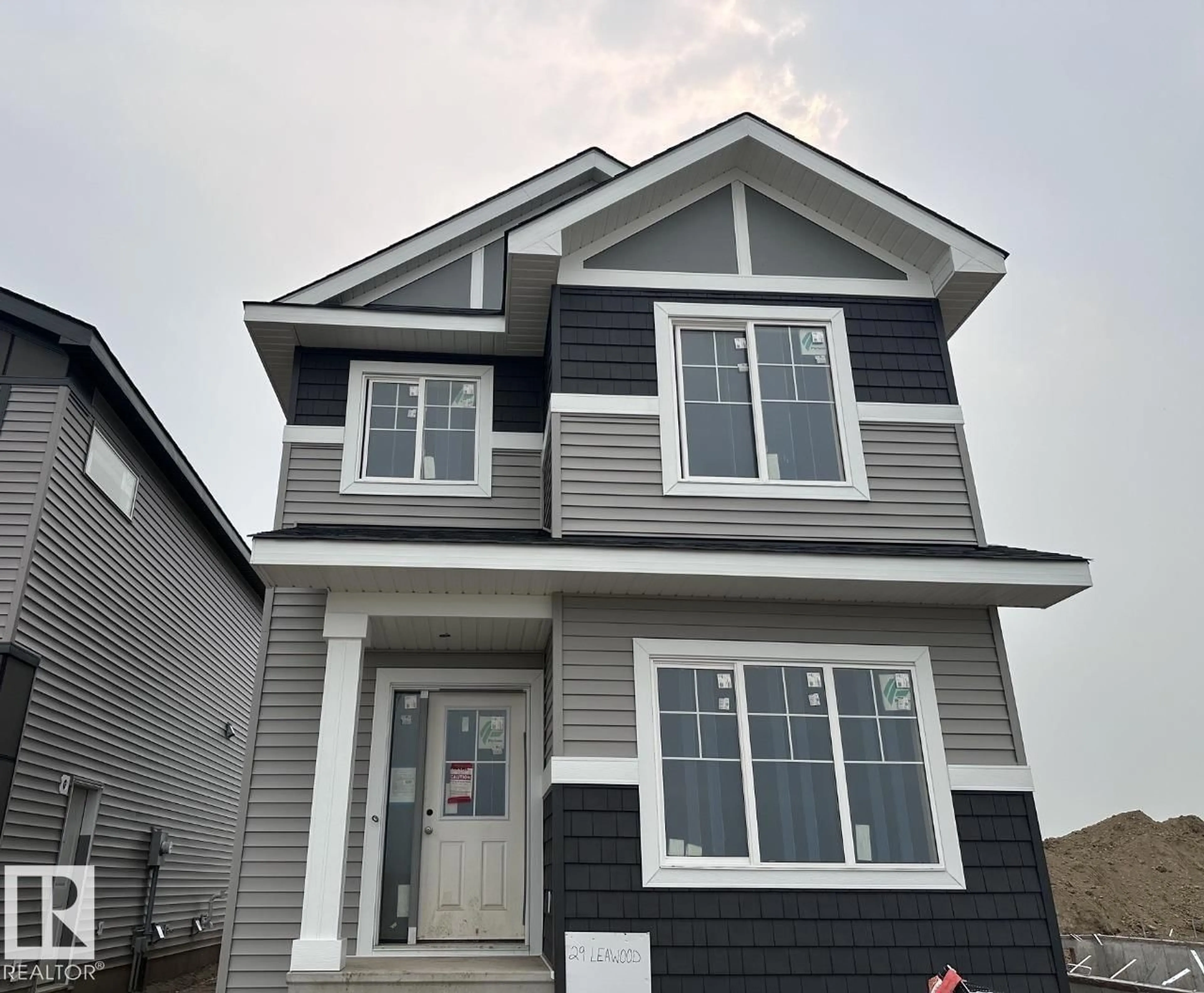 Home with vinyl exterior material, street for 29 LEAWOOD LI, Spruce Grove Alberta T7X4B8