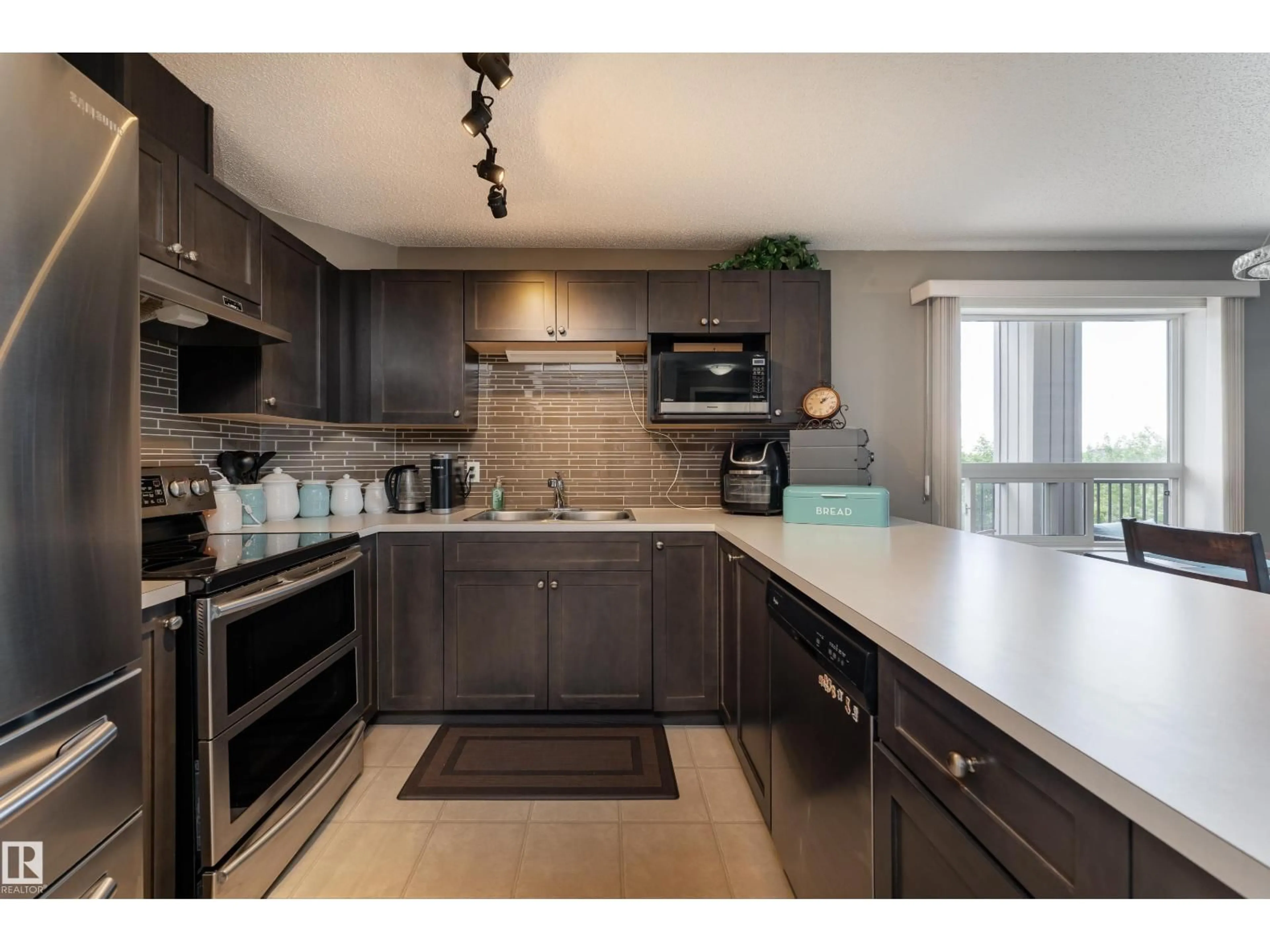 Open concept kitchen, unknown for #347 - 1520 HAMMOND GATE, Edmonton Alberta T6M0J4
