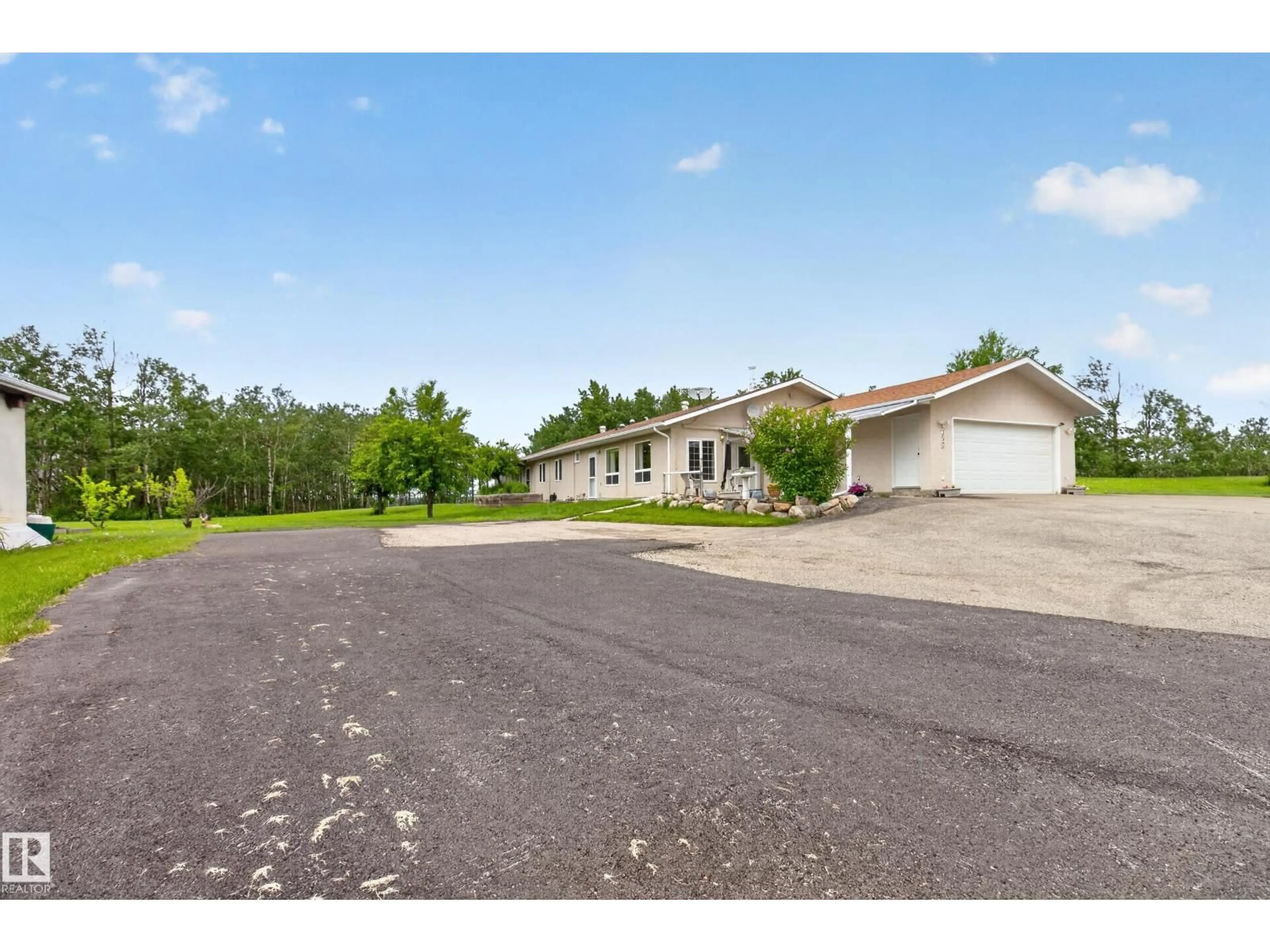 A pic from outside/outdoor area/front of a property/back of a property/a pic from drone, street for 52343 - 350 RGE ROAD 211, Rural Strathcona County Alberta T8G1A6