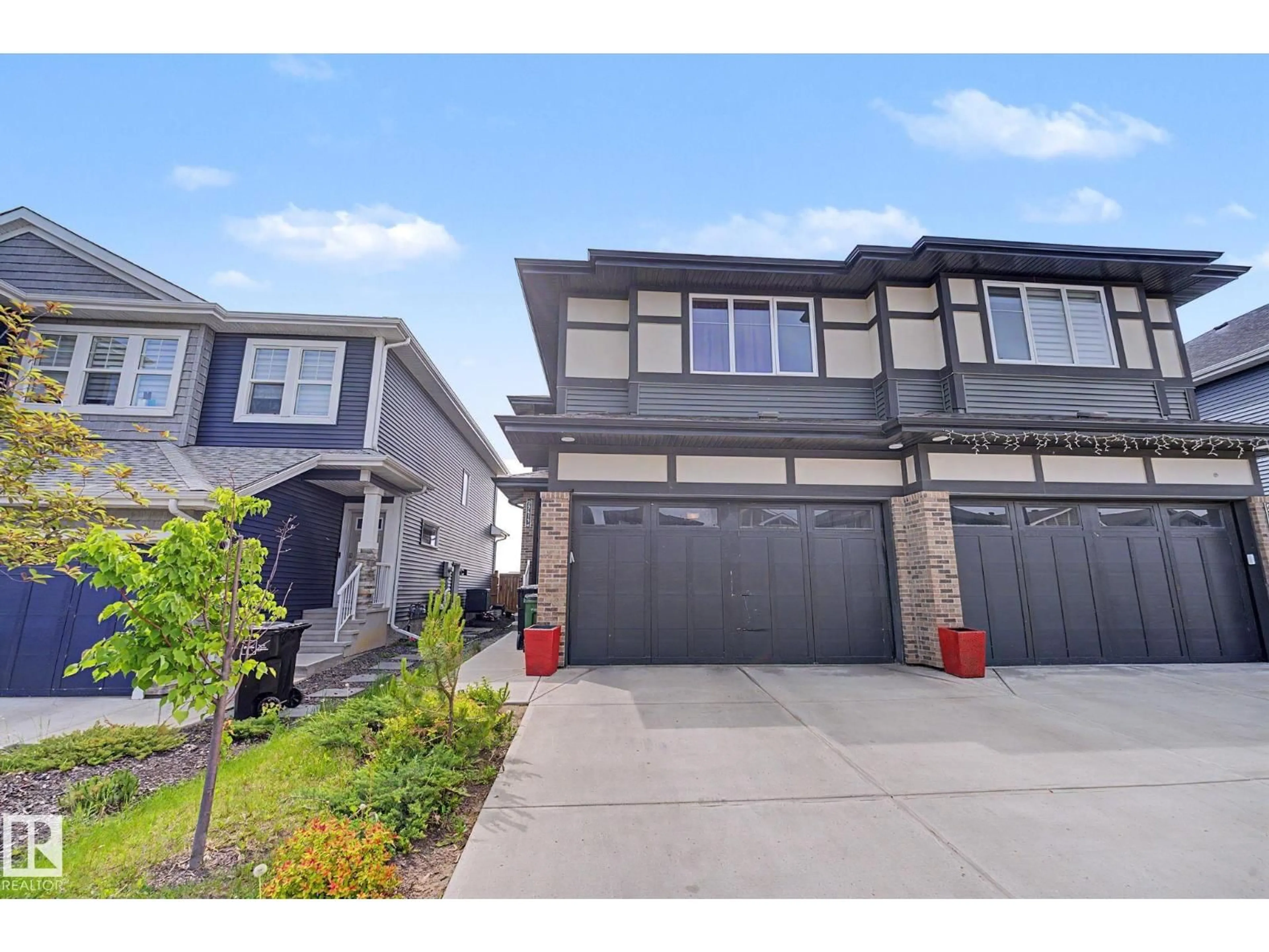 Home with vinyl exterior material, street for 22419 80 AV, Edmonton Alberta T5T7H8