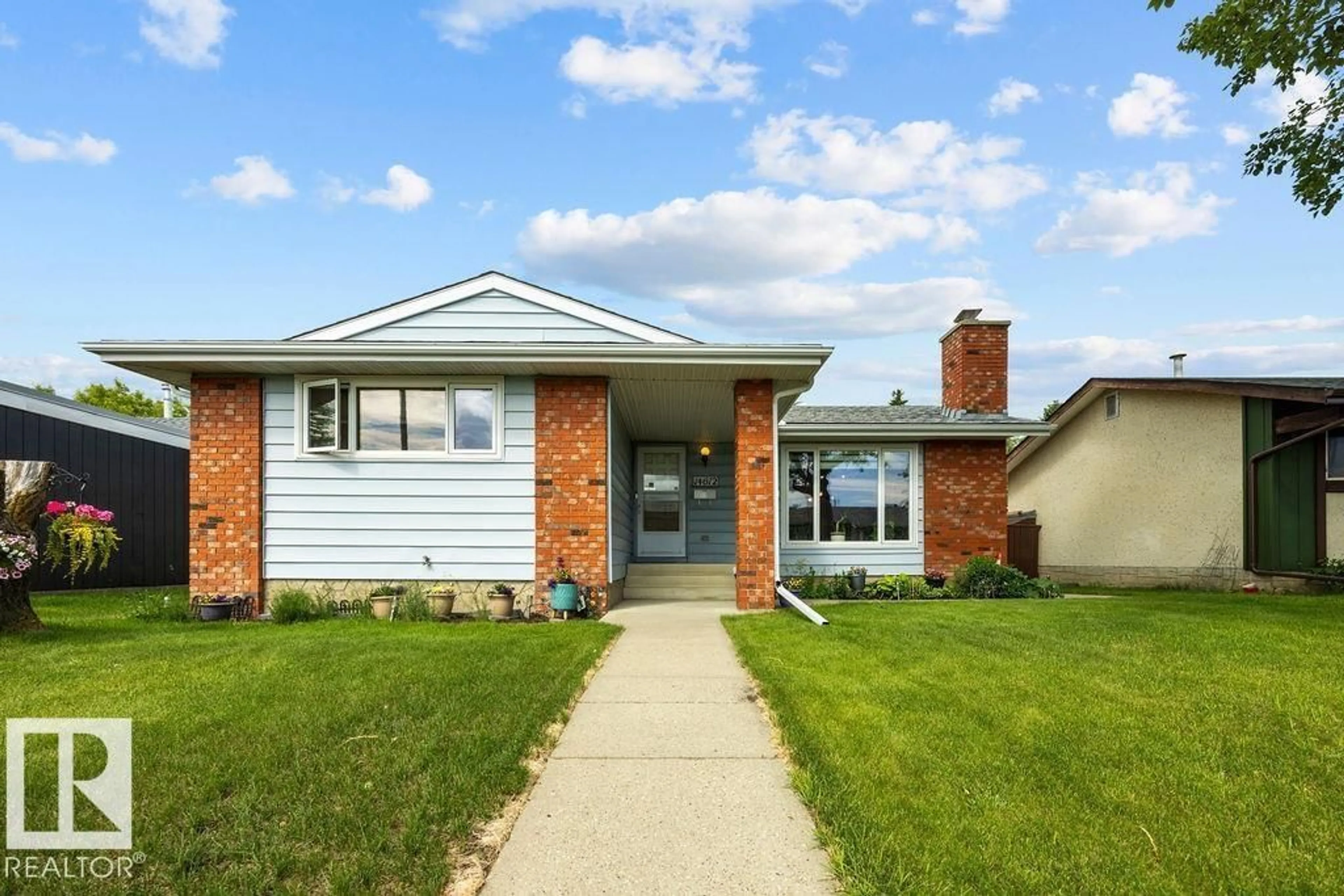 Home with brick exterior material, street for NW - 14612 117A ST, Edmonton Alberta T5X1K2