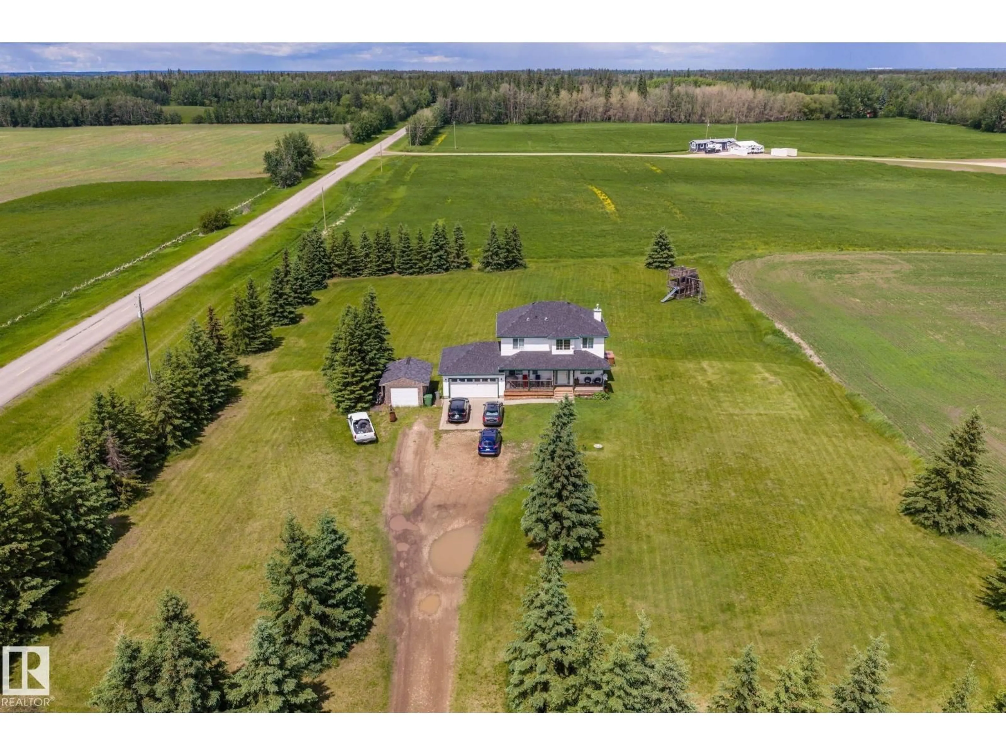 A pic from outside/outdoor area/front of a property/back of a property/a pic from drone, unknown for 51305 RGE ROAD 271, Rural Parkland County Alberta T7Y1G6
