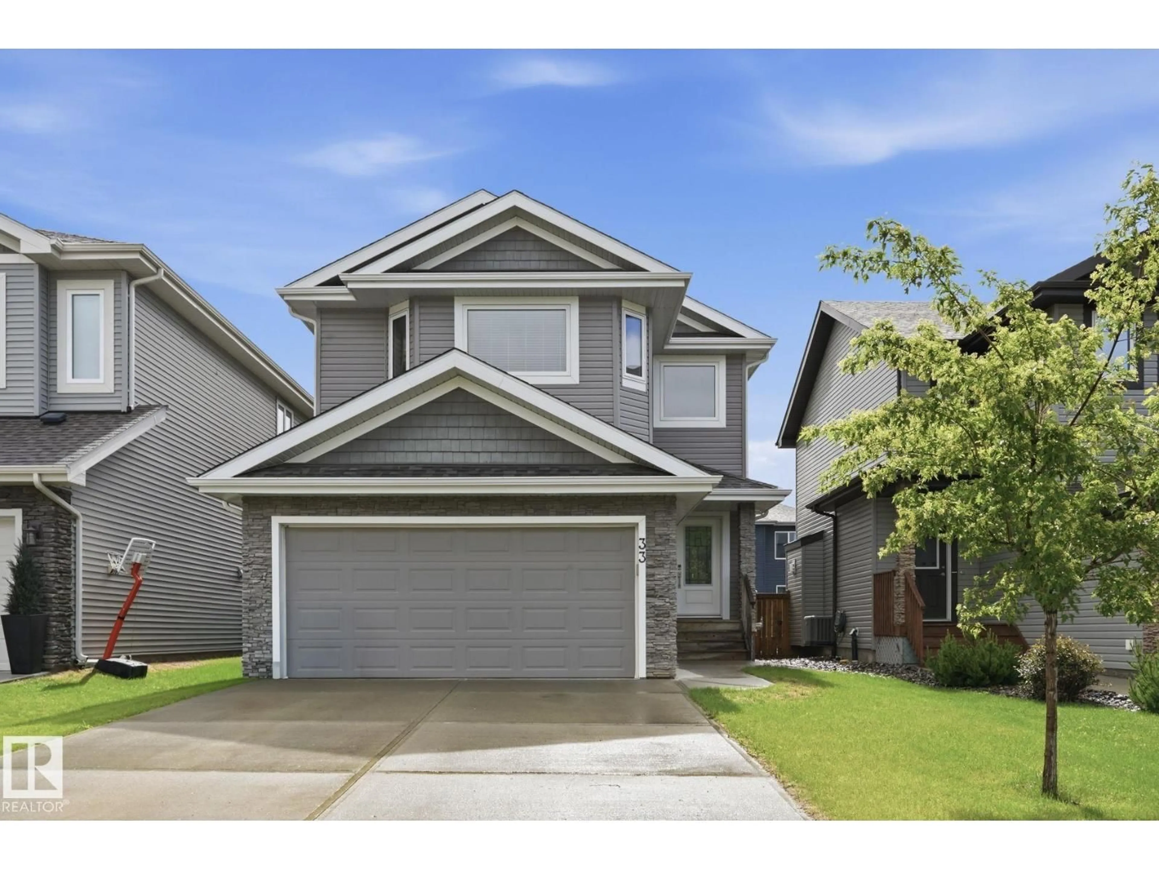 Home with vinyl exterior material, street for 33 RIVIERE TC, St. Albert Alberta T8N7N9