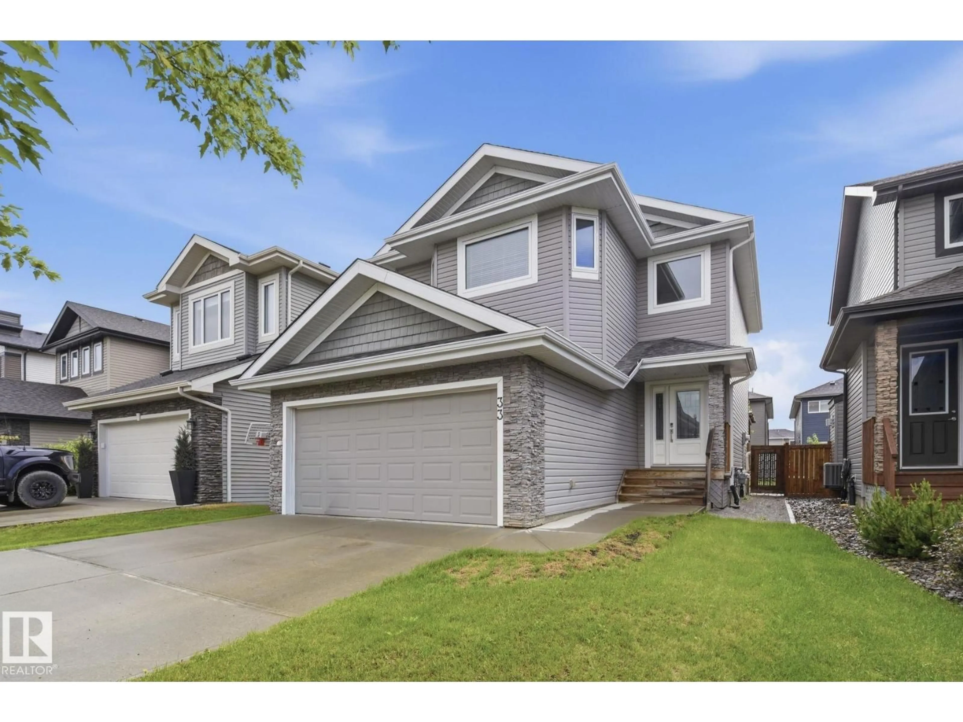 Home with vinyl exterior material, street for 33 RIVIERE TC, St. Albert Alberta T8N7N9