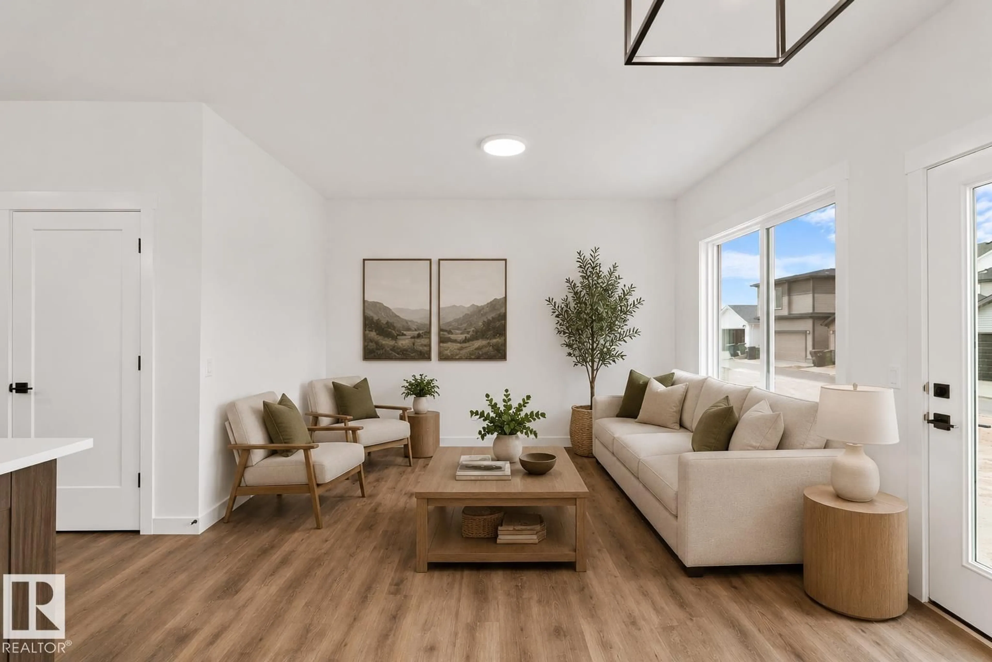Living room with furniture, wood/laminate floor for 182 STETSON LO, Ardrossan Alberta T8E0C1