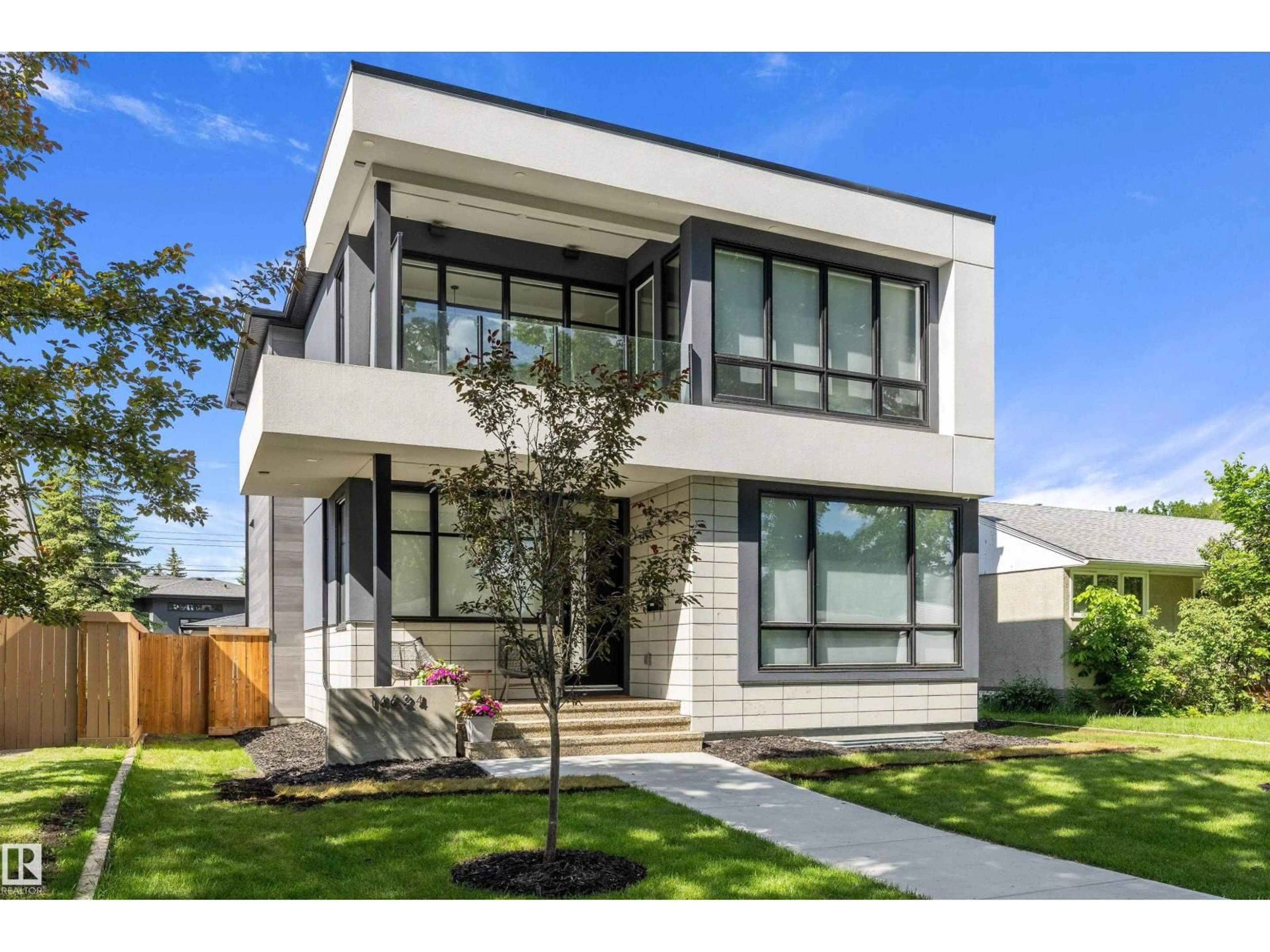 Home with vinyl exterior material, street for 14624 93 AV, Edmonton Alberta T5R5G6