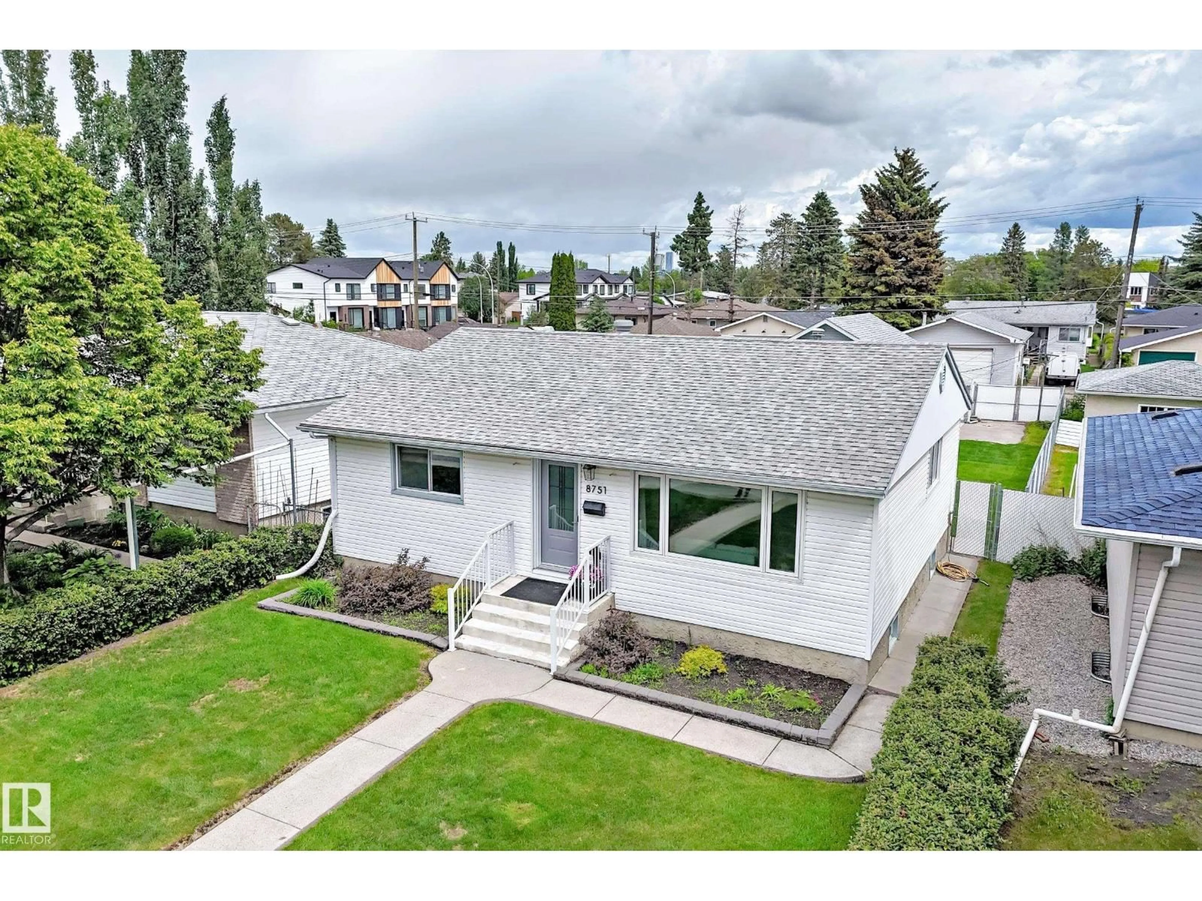 A pic from outside/outdoor area/front of a property/back of a property/a pic from drone, street for NW - 8751 155 ST, Edmonton Alberta T5R1W1