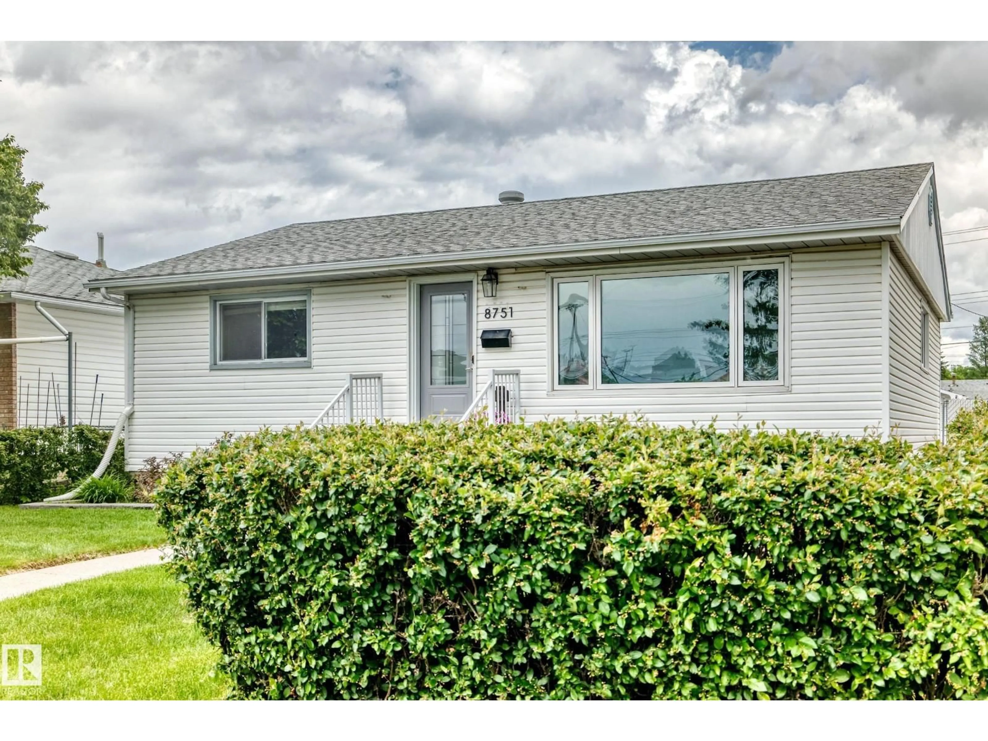 Home with vinyl exterior material, street for NW - 8751 155 ST, Edmonton Alberta T5R1W1