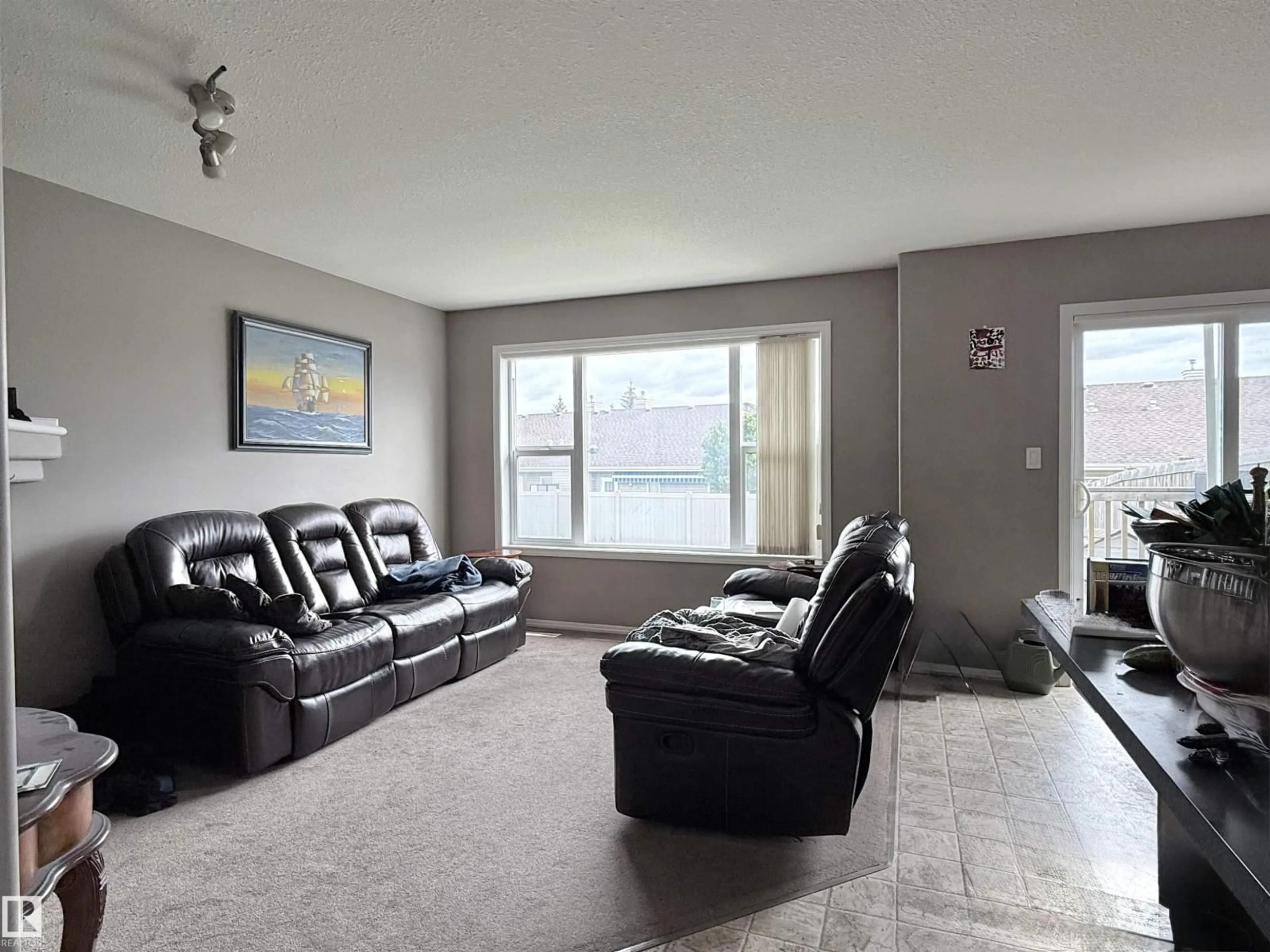 Living room with furniture, unknown for 129 GALLOWAY WD, Fort Saskatchewan Alberta T8L0B9