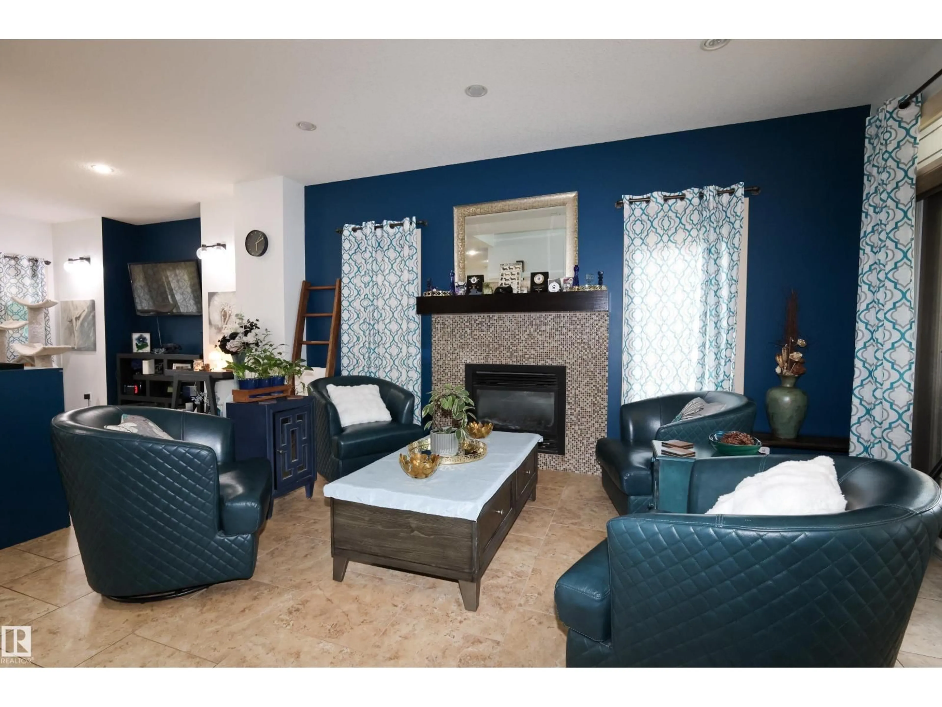 Living room with furniture, ceramic/tile floor for 9720 102 AV, Morinville Alberta T8R0C8