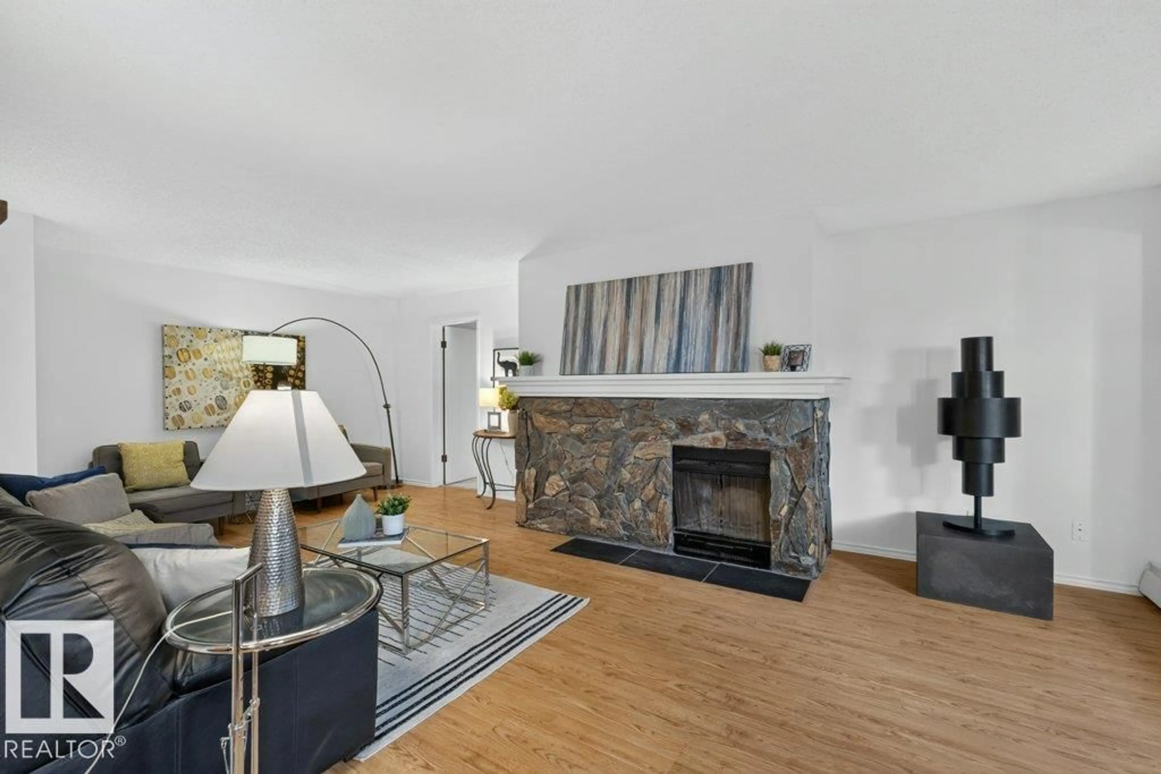 Living room with furniture, wood/laminate floor for #3 - 10160 119 ST, Edmonton Alberta T5K1Y9