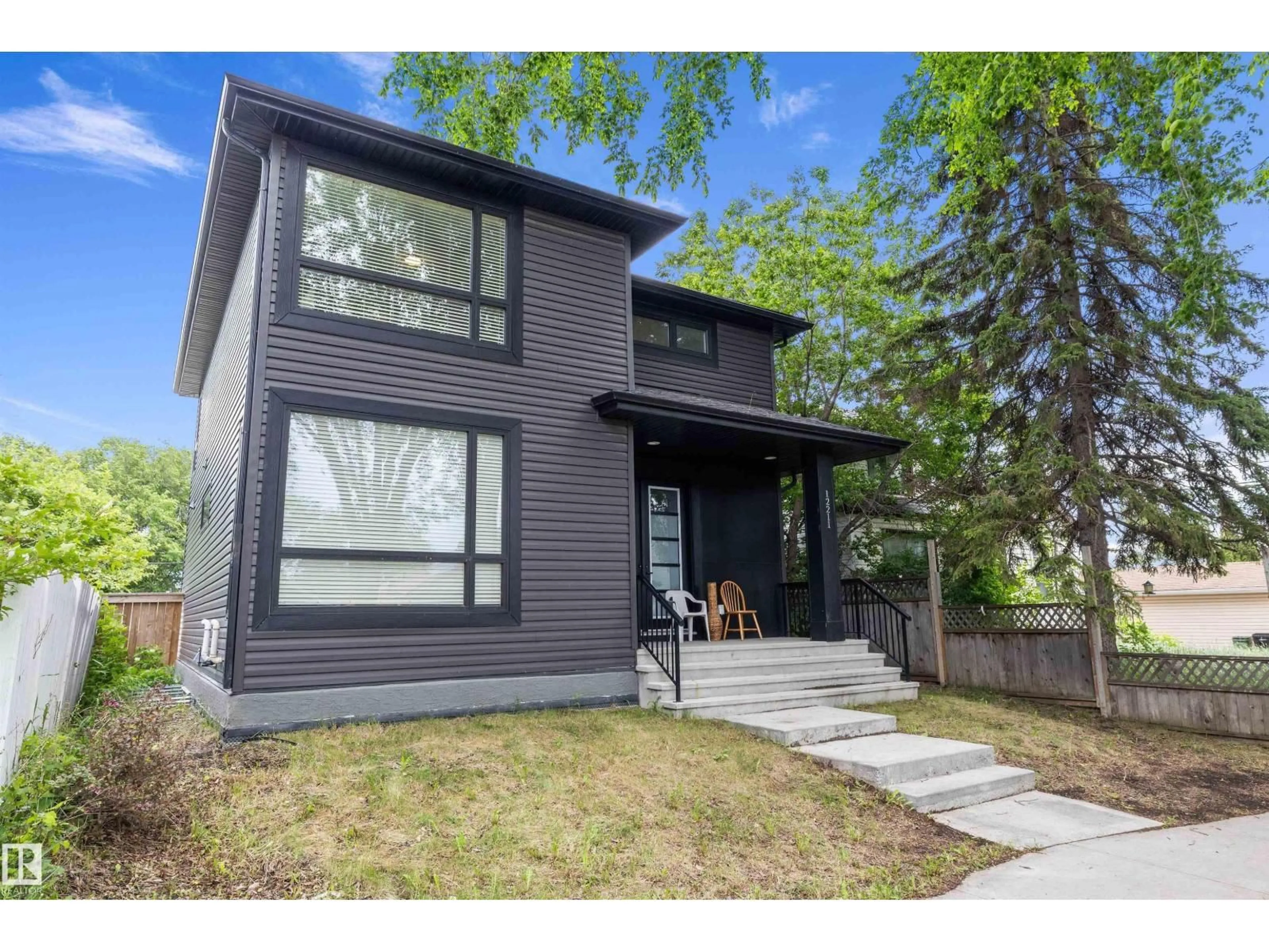 Home with vinyl exterior material, street for NW - 12211 57 ST, Edmonton Alberta T5W3W2