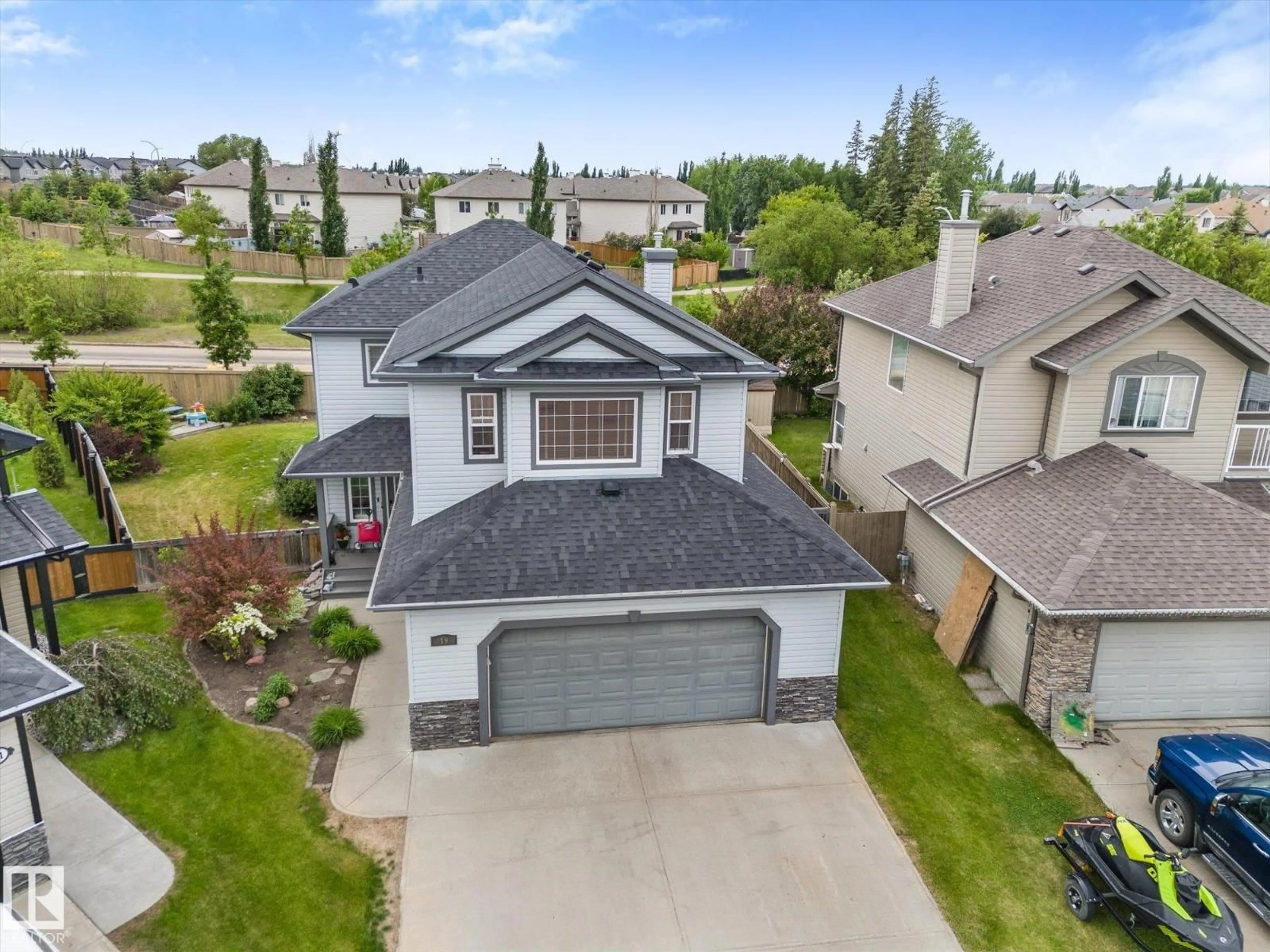 A pic from outside/outdoor area/front of a property/back of a property/a pic from drone, street for 19 HUXLEY CV, Spruce Grove Alberta T7X4S5