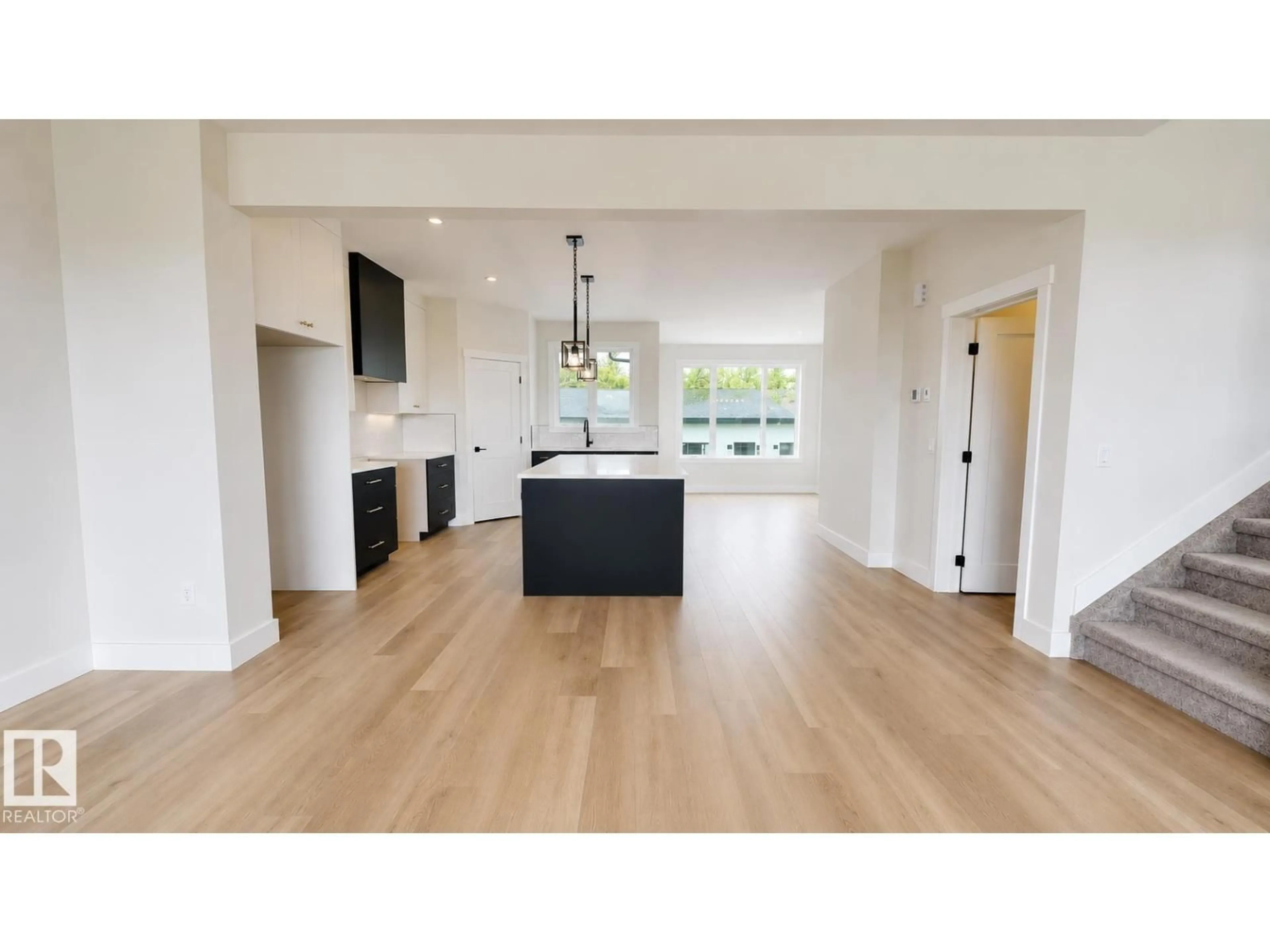 Open concept kitchen, wood/laminate floor for 4710 49 ST, Calmar Alberta T0C0V0