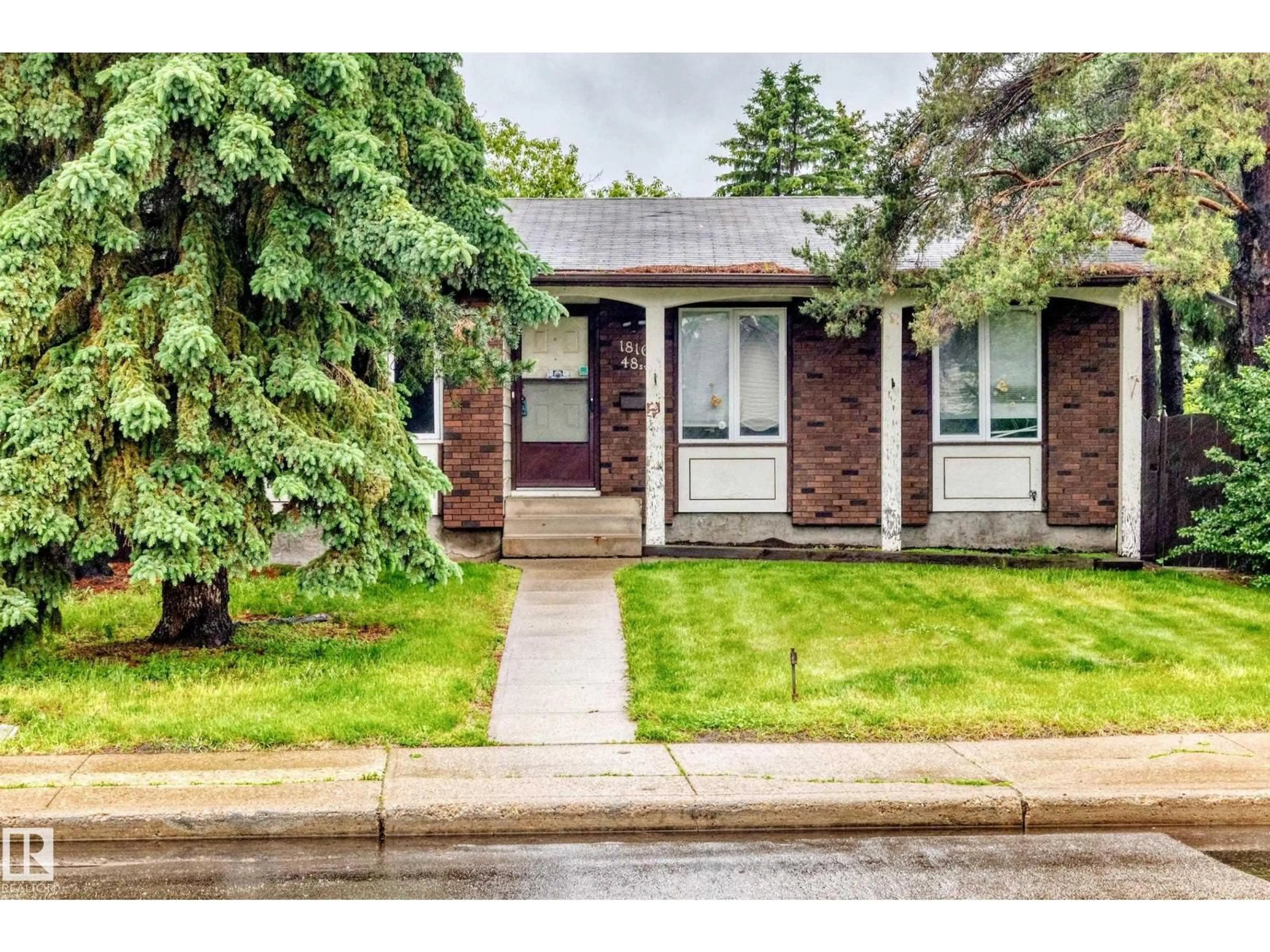 Home with brick exterior material, street for 1816 48 ST, Edmonton Alberta T6L2X6
