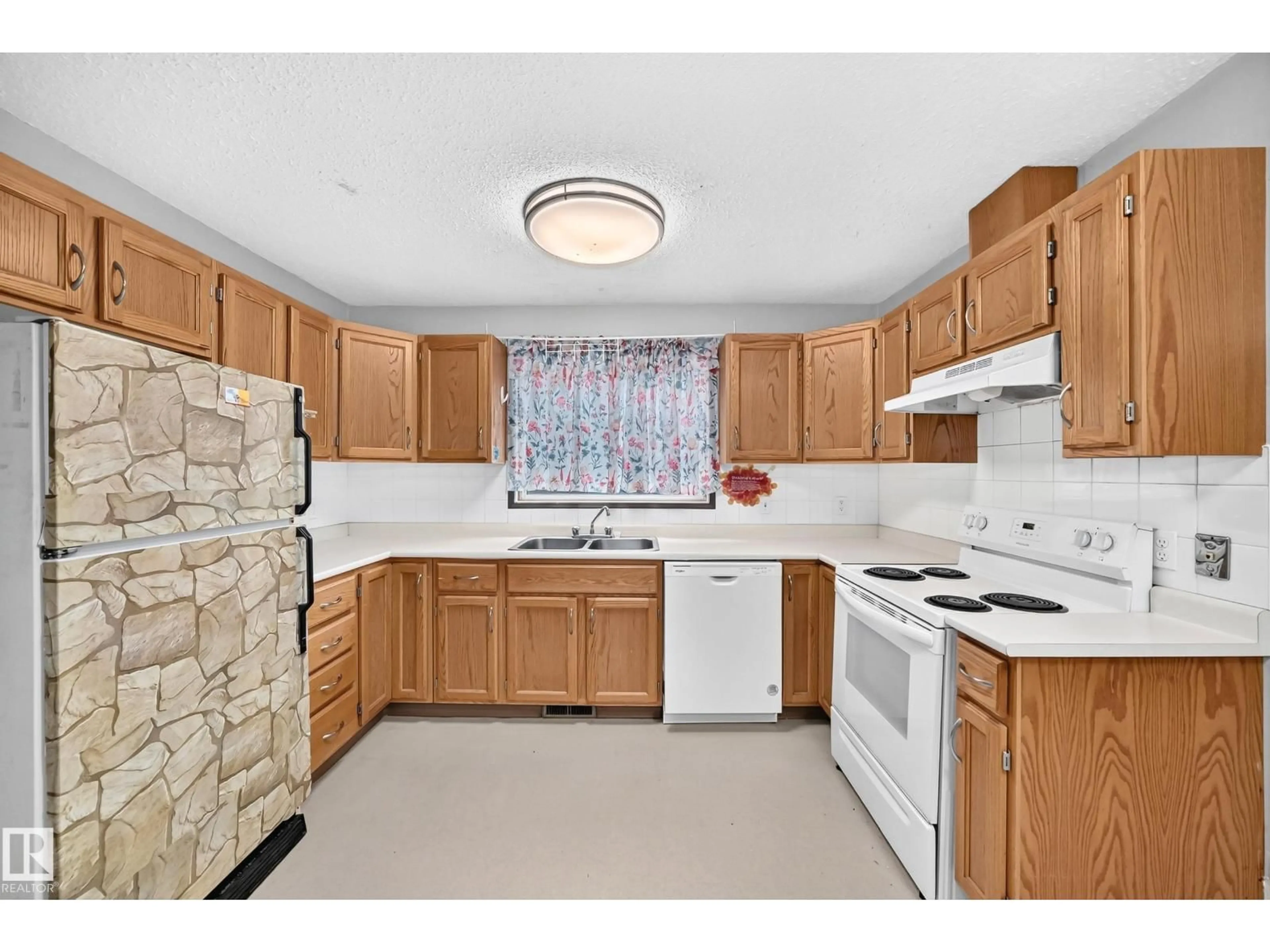 Standard kitchen, ceramic/tile floor for 1816 48 ST, Edmonton Alberta T6L2X6