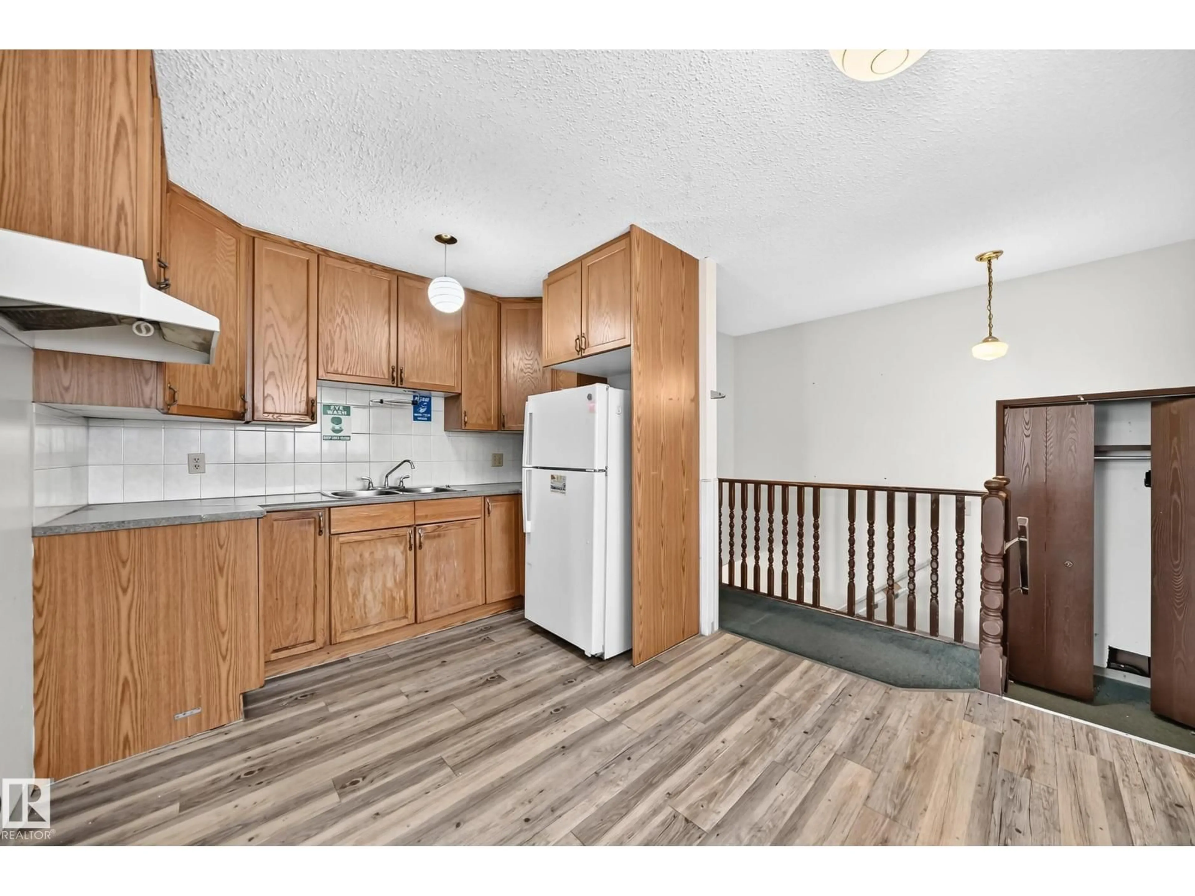 Standard kitchen, wood/laminate floor for 2071 49A ST, Edmonton Alberta T6L2W9