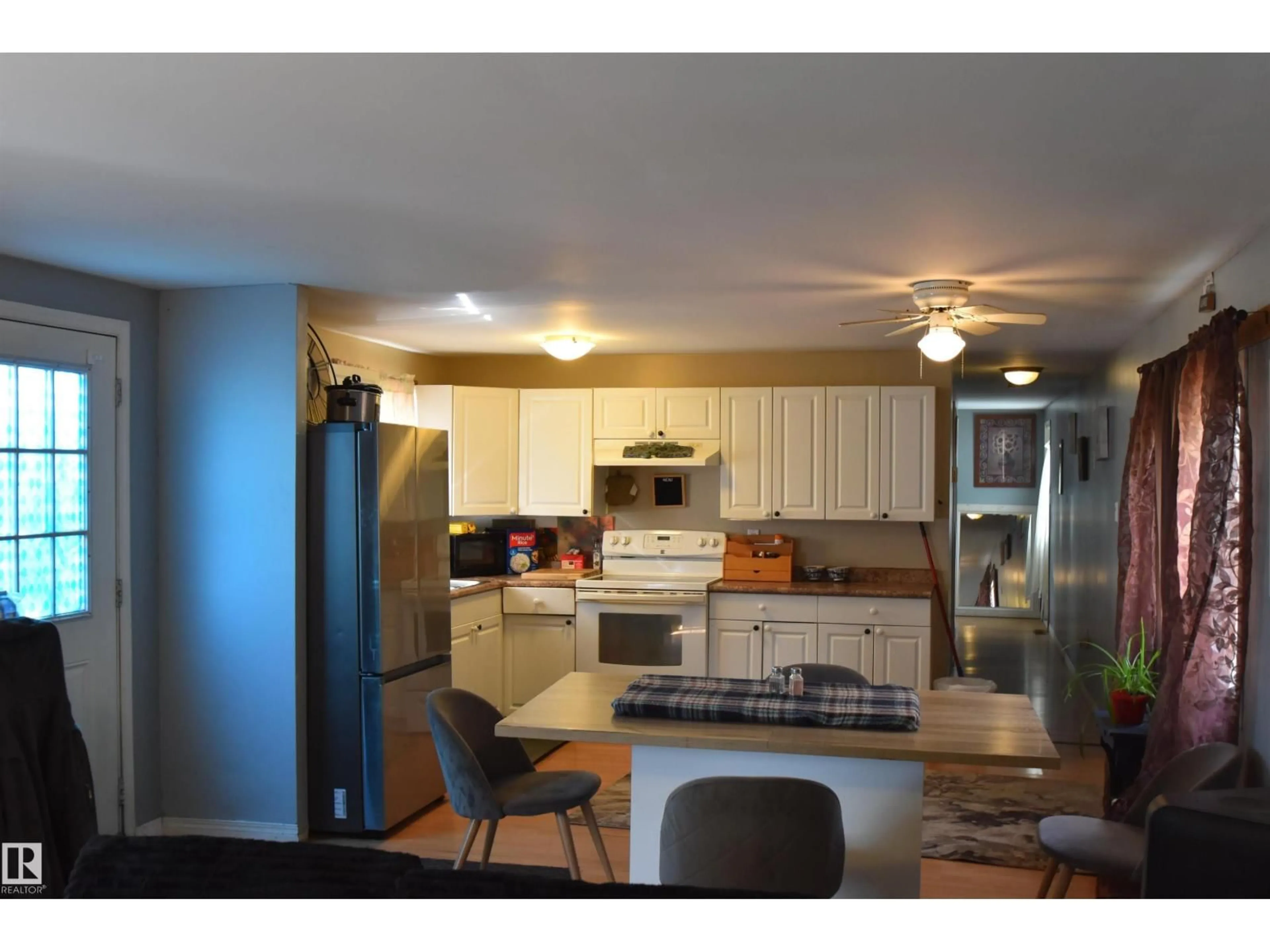 Open concept kitchen, wood/laminate floor for 5414 54 STREET, St. Paul Town Alberta T0A3A3