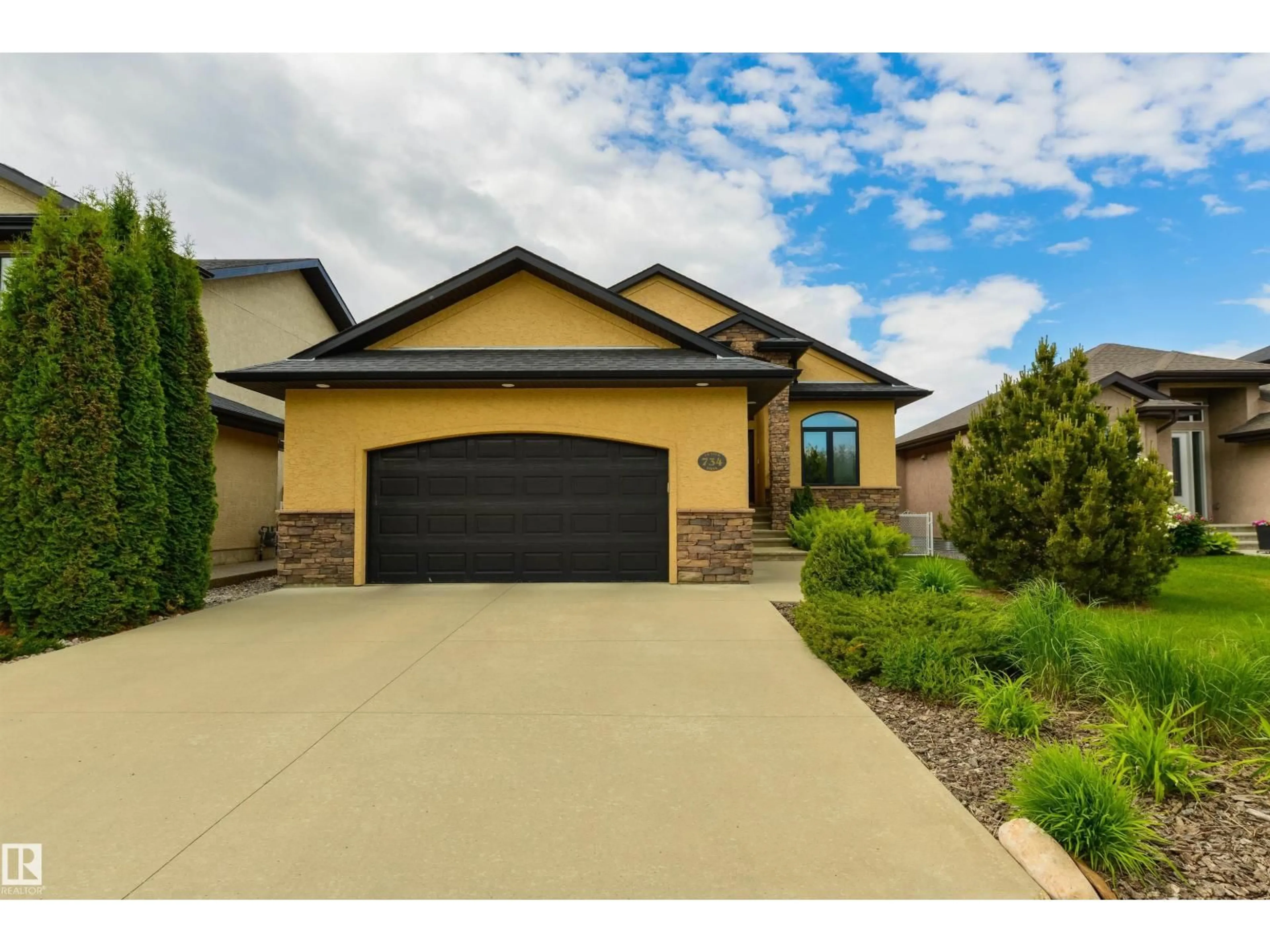 Home with brick exterior material, street for NW - 734 FRASER VISTA VS, Edmonton Alberta T5Y0L6