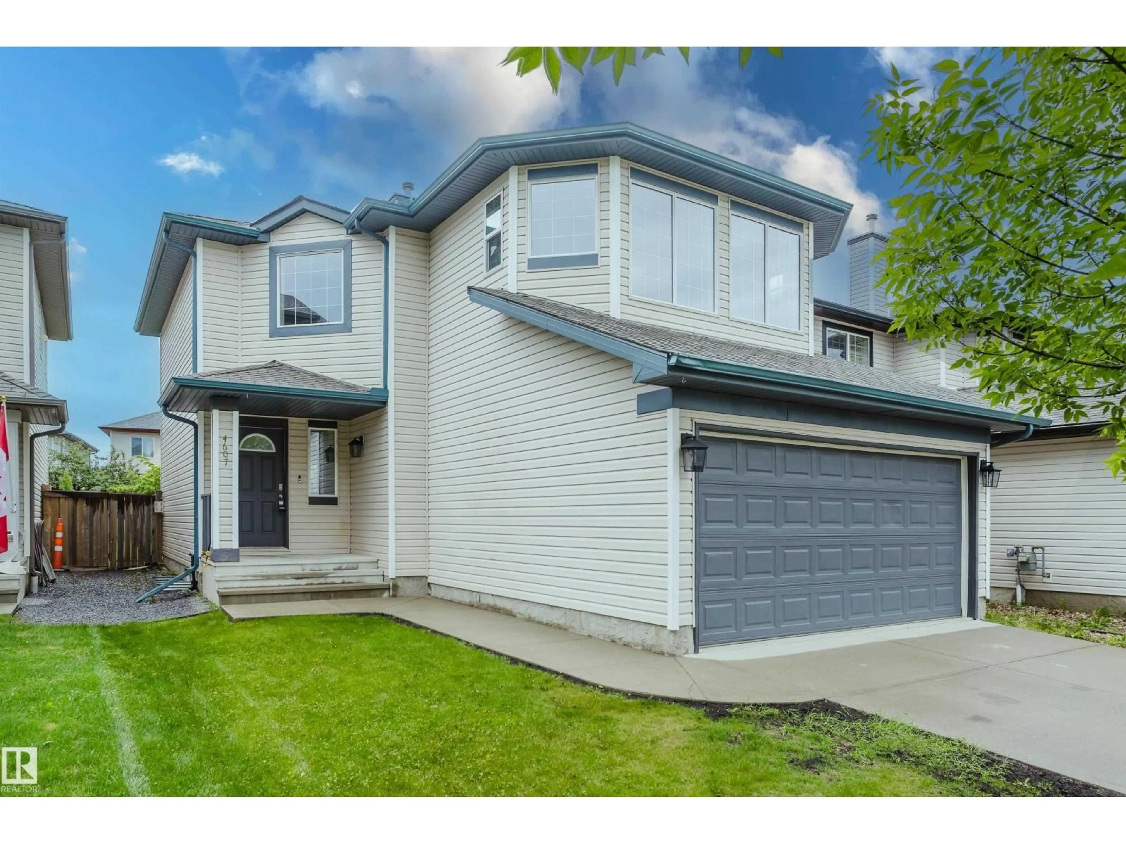 Home with vinyl exterior material, street for NW - 4607 205 ST, Edmonton Alberta T6M0E3
