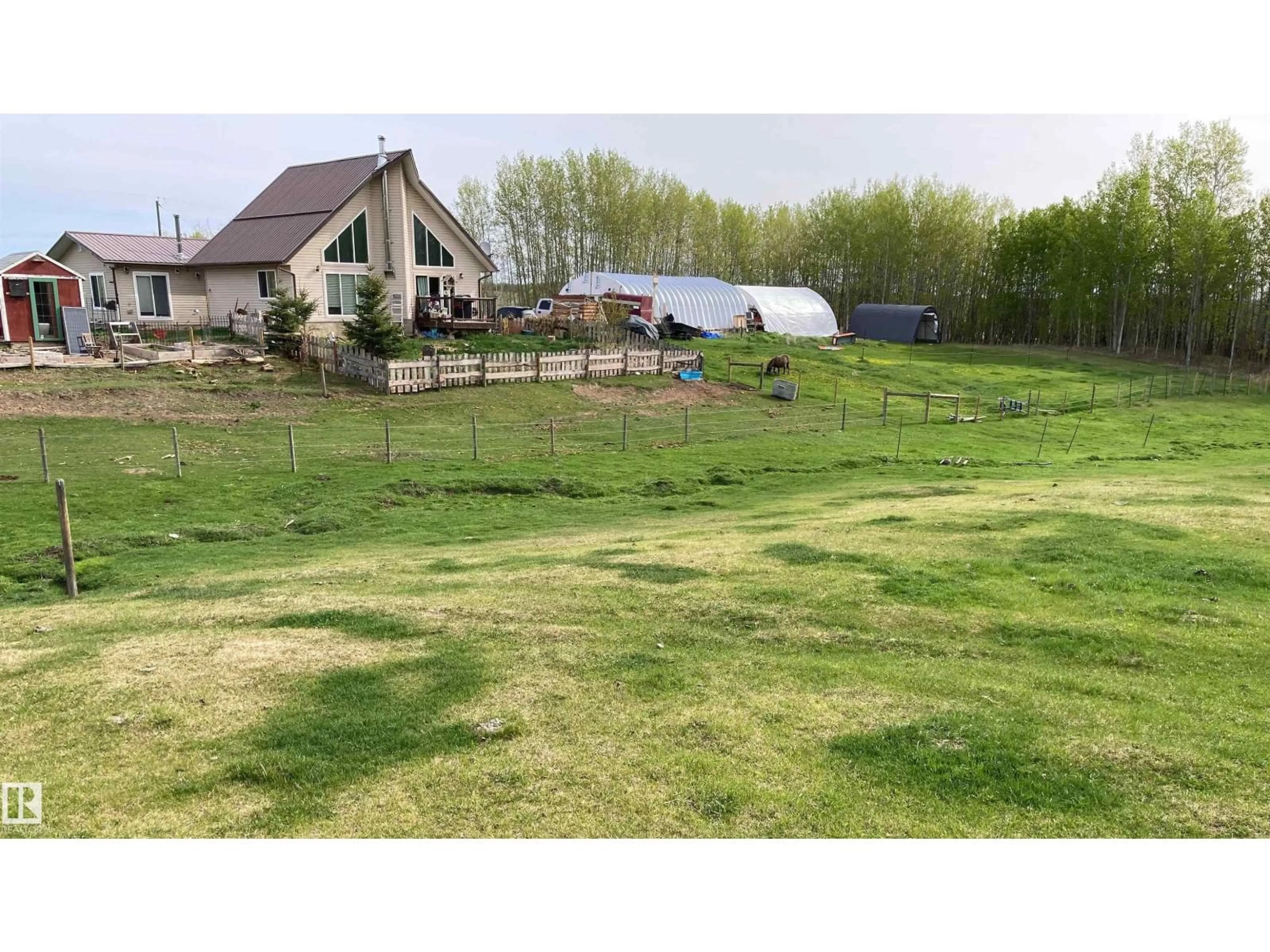 A pic from outside/outdoor area/front of a property/back of a property/a pic from drone, mountain view for 6129 TWP ROAD 540, Rural Lac Ste. Anne County Alberta T0E0L0